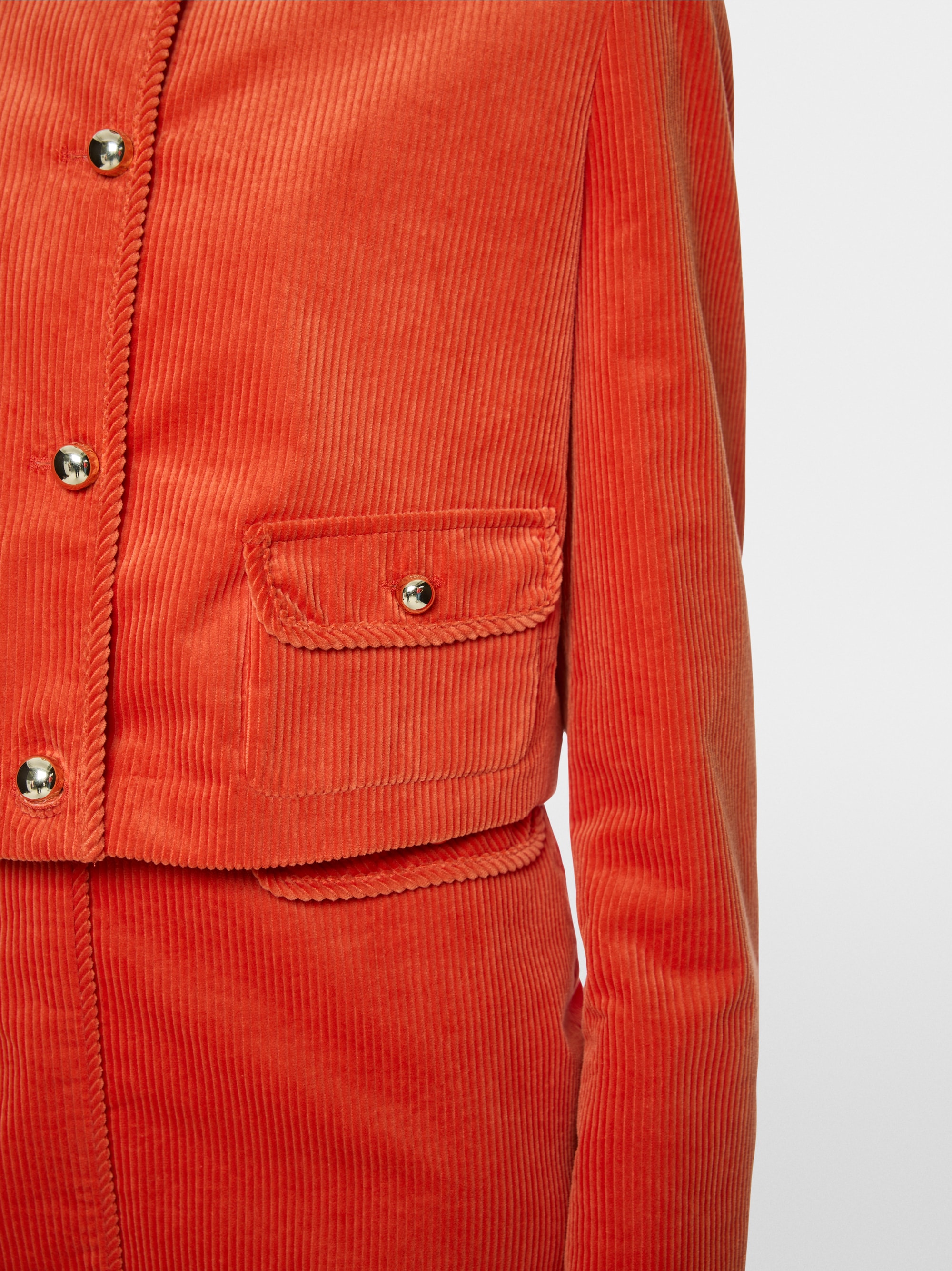Short jacket with decorative buttons