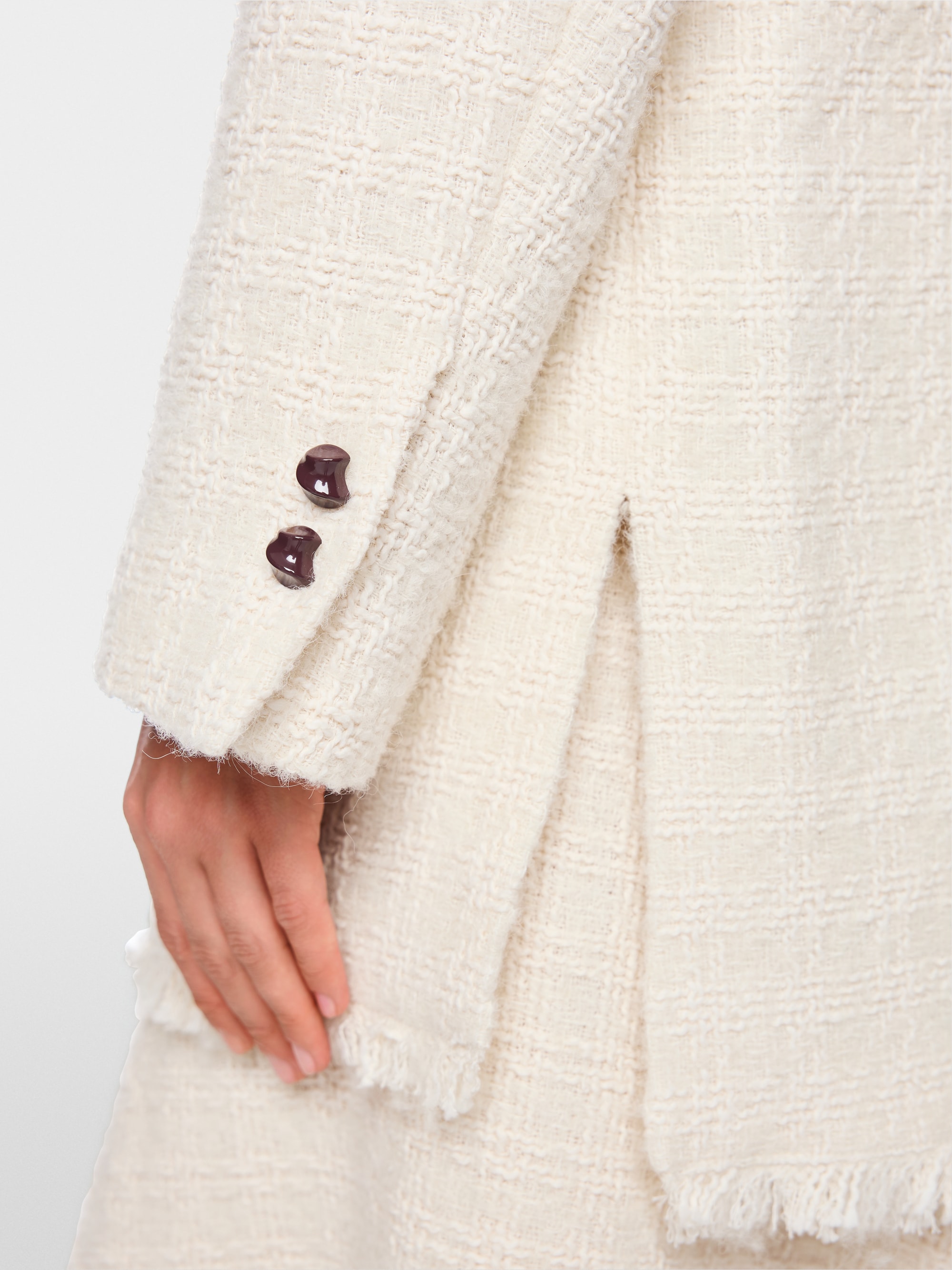 Bouclé jacket with fringing
