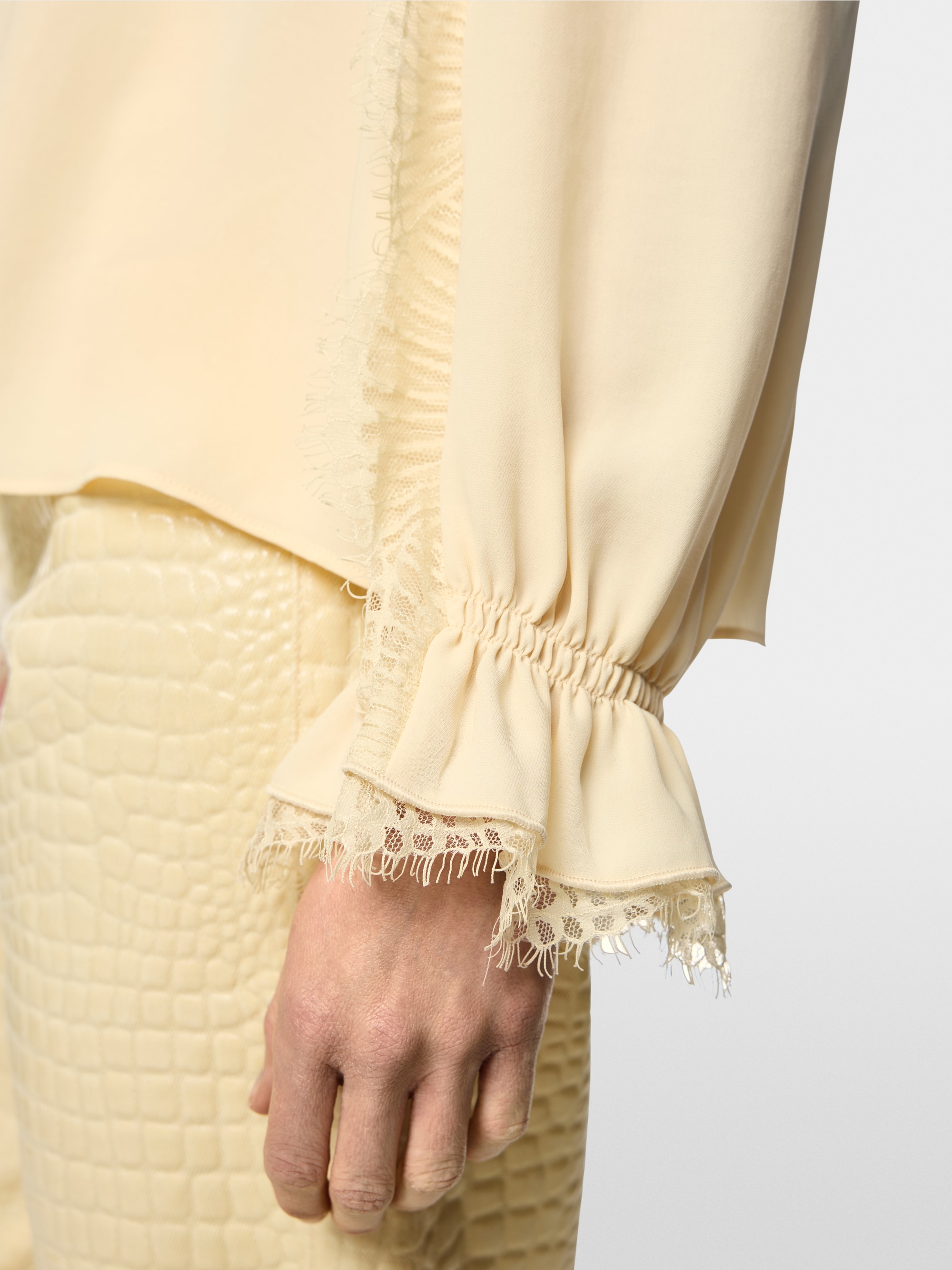 Flowing blouse with lace