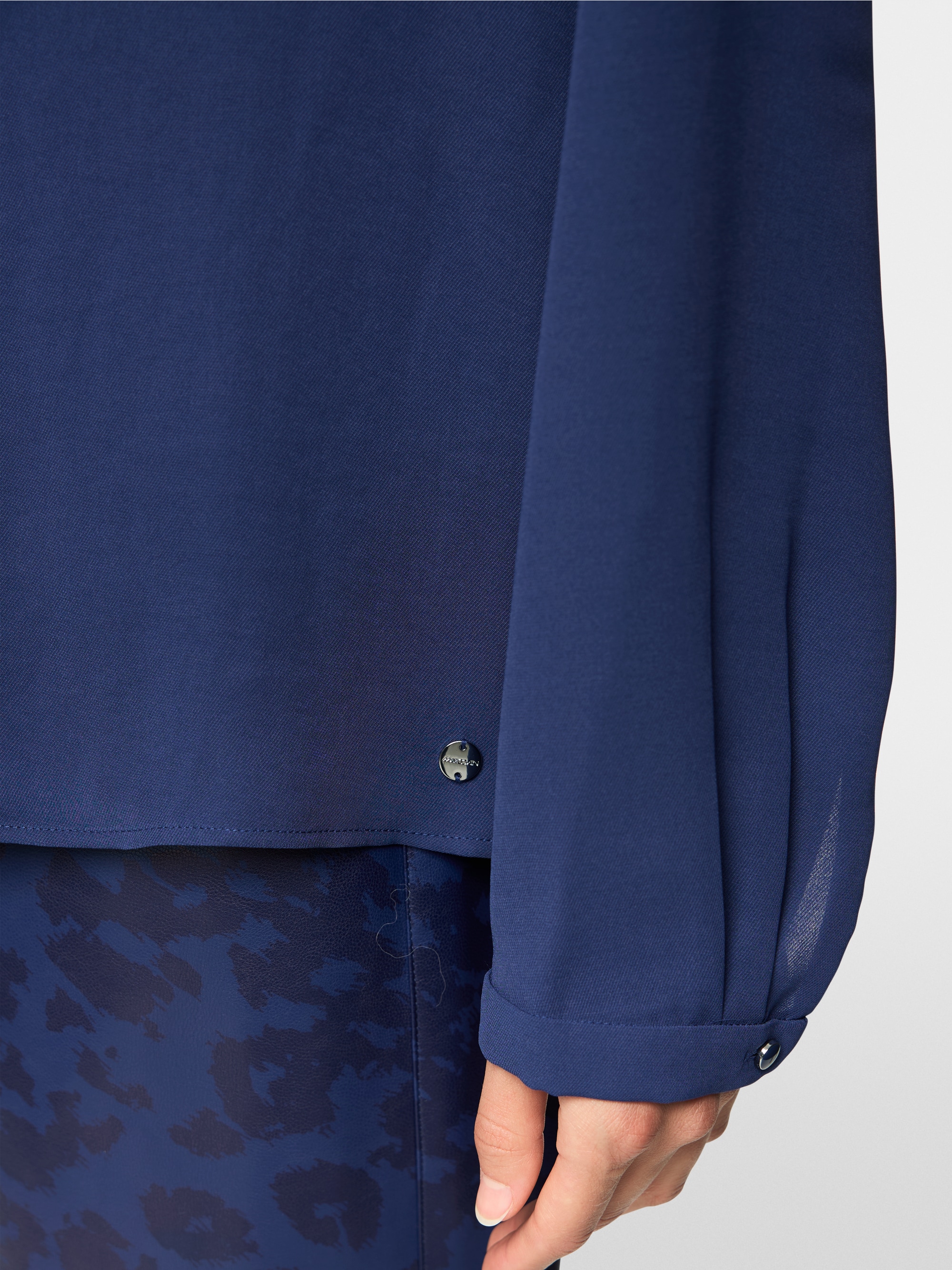 Blouse with flounces
