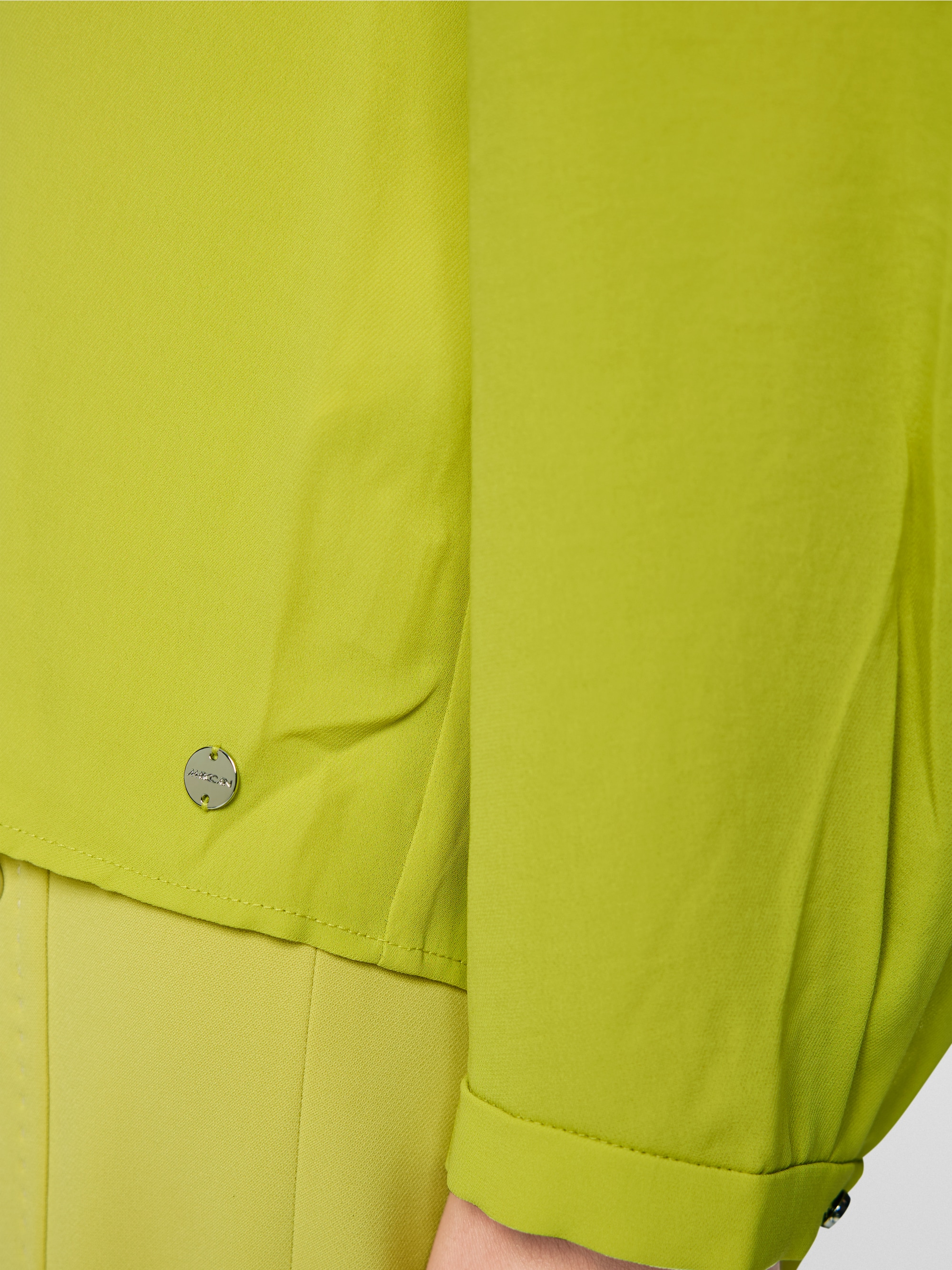 Blouse with flounces