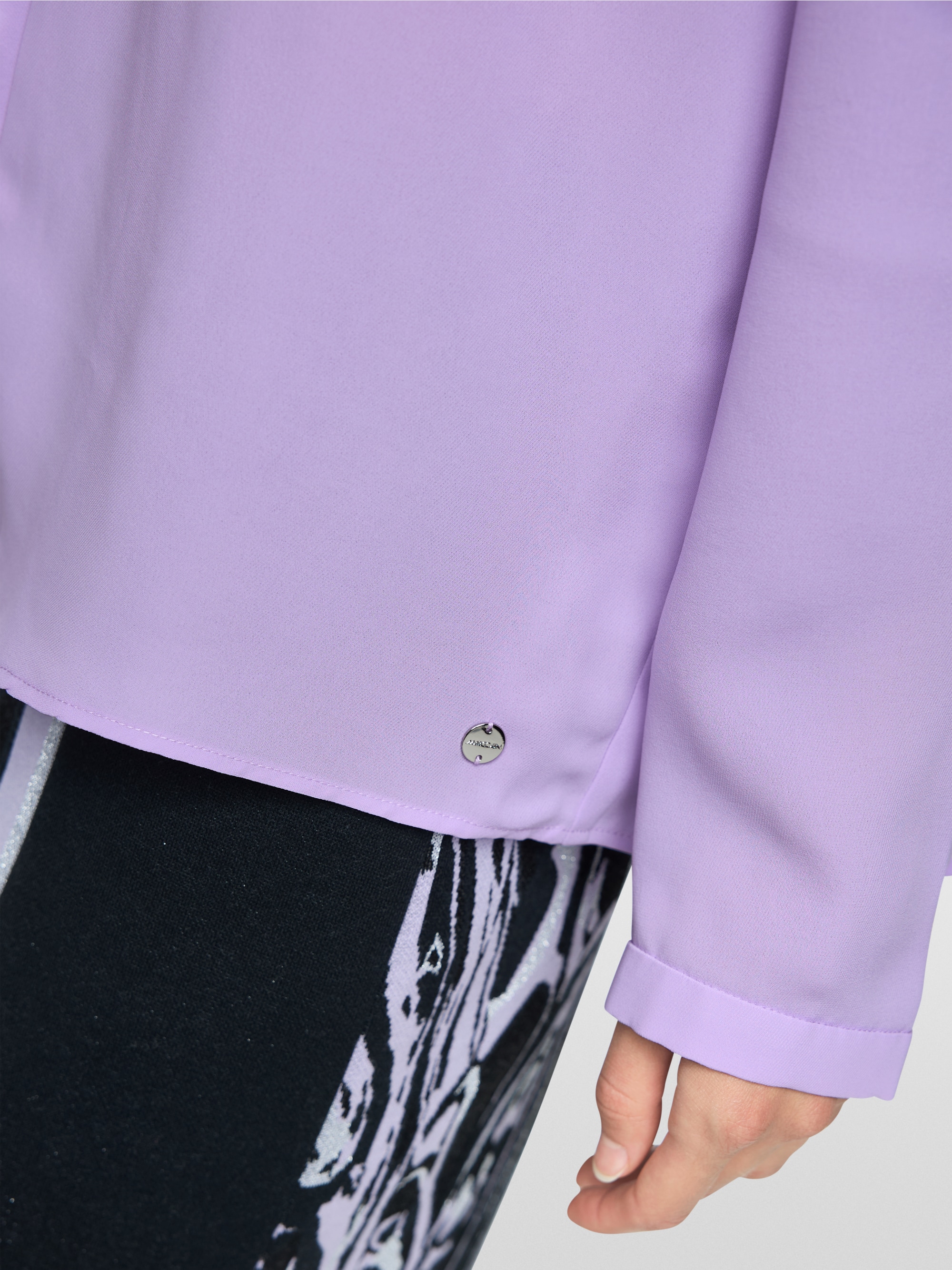 Blouse with flounces