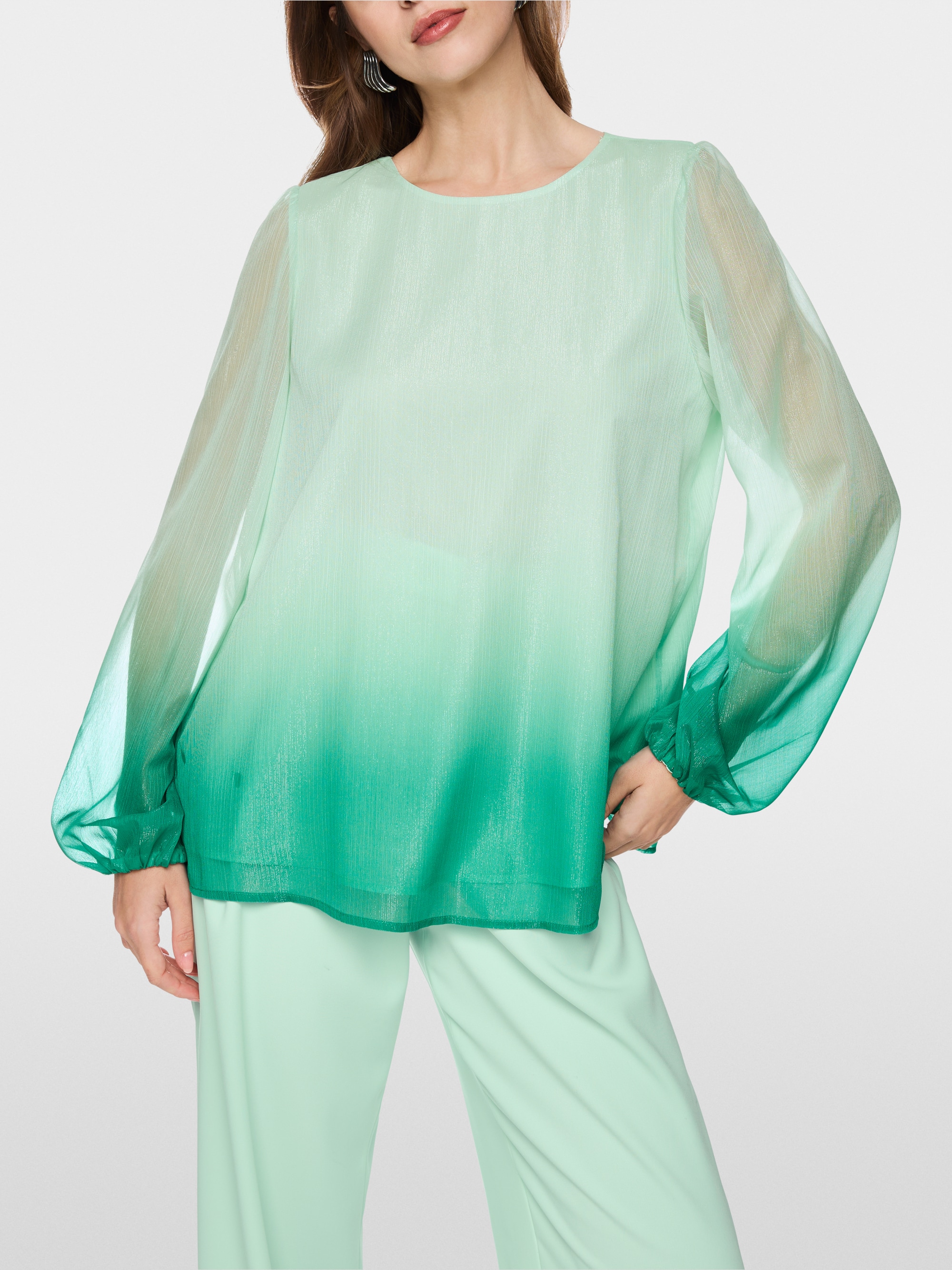 Tunic blouse with elasticated cuffs