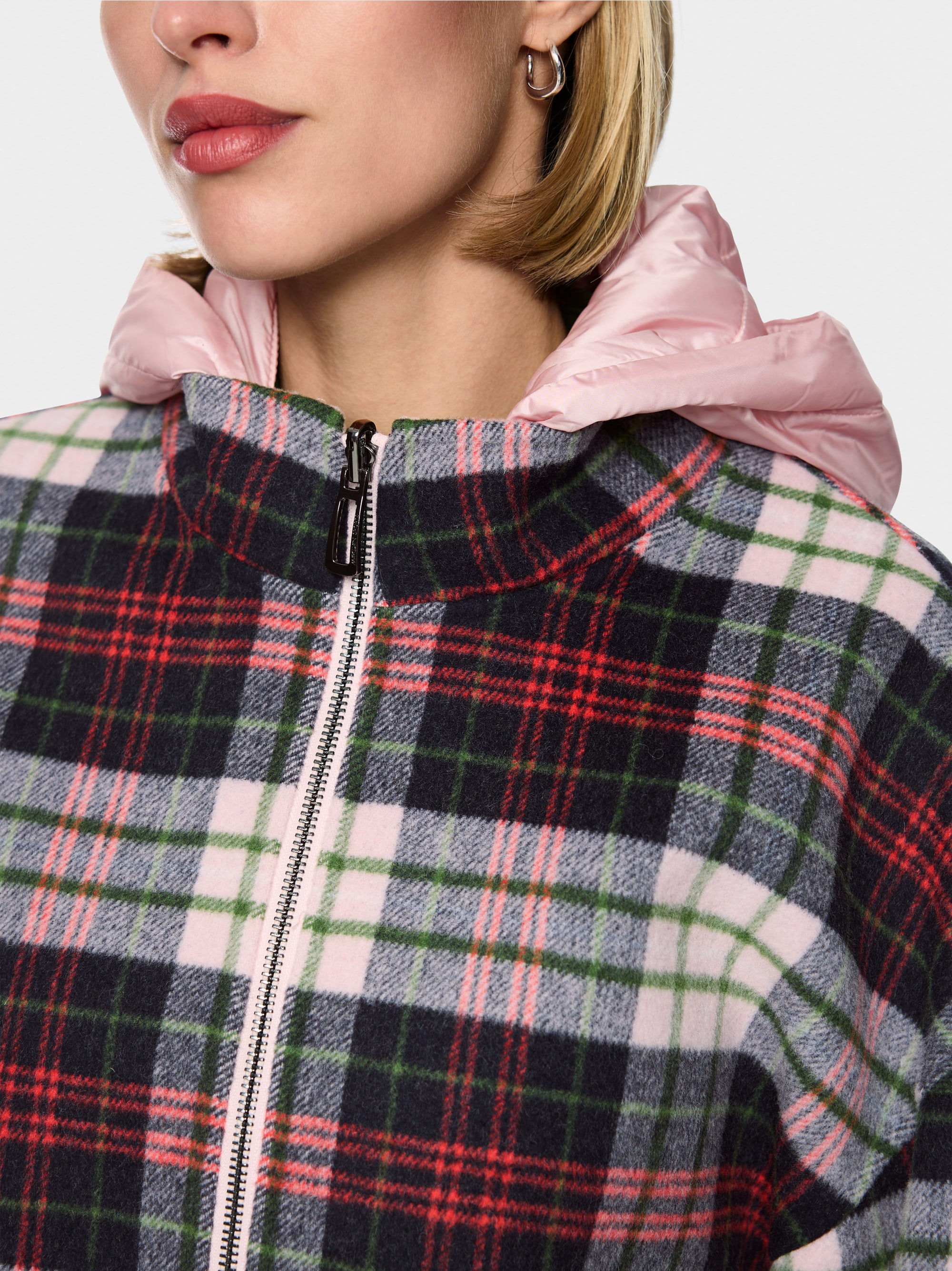 Reversible jacket with quilted hood