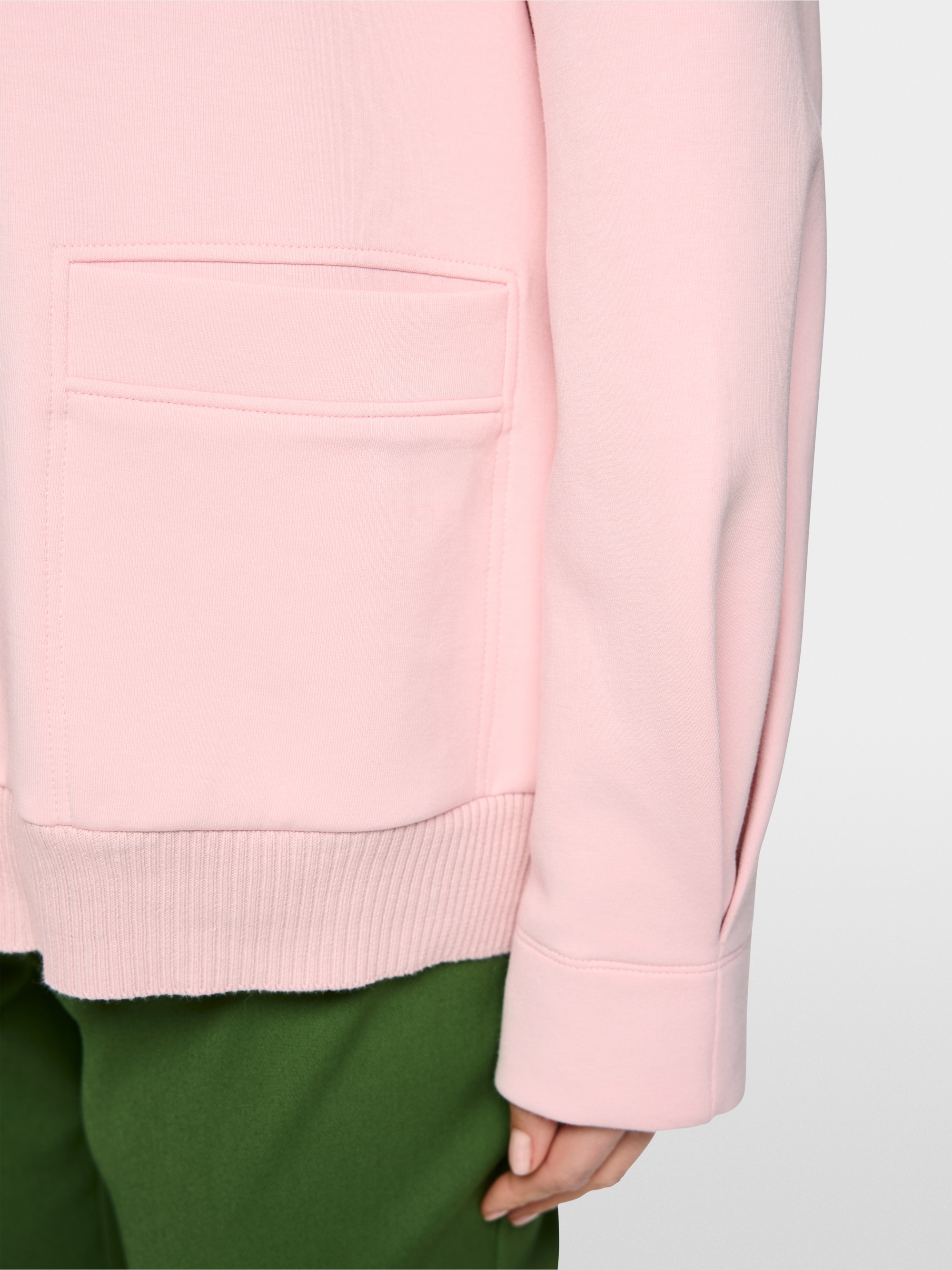 Jacket with knitted details
