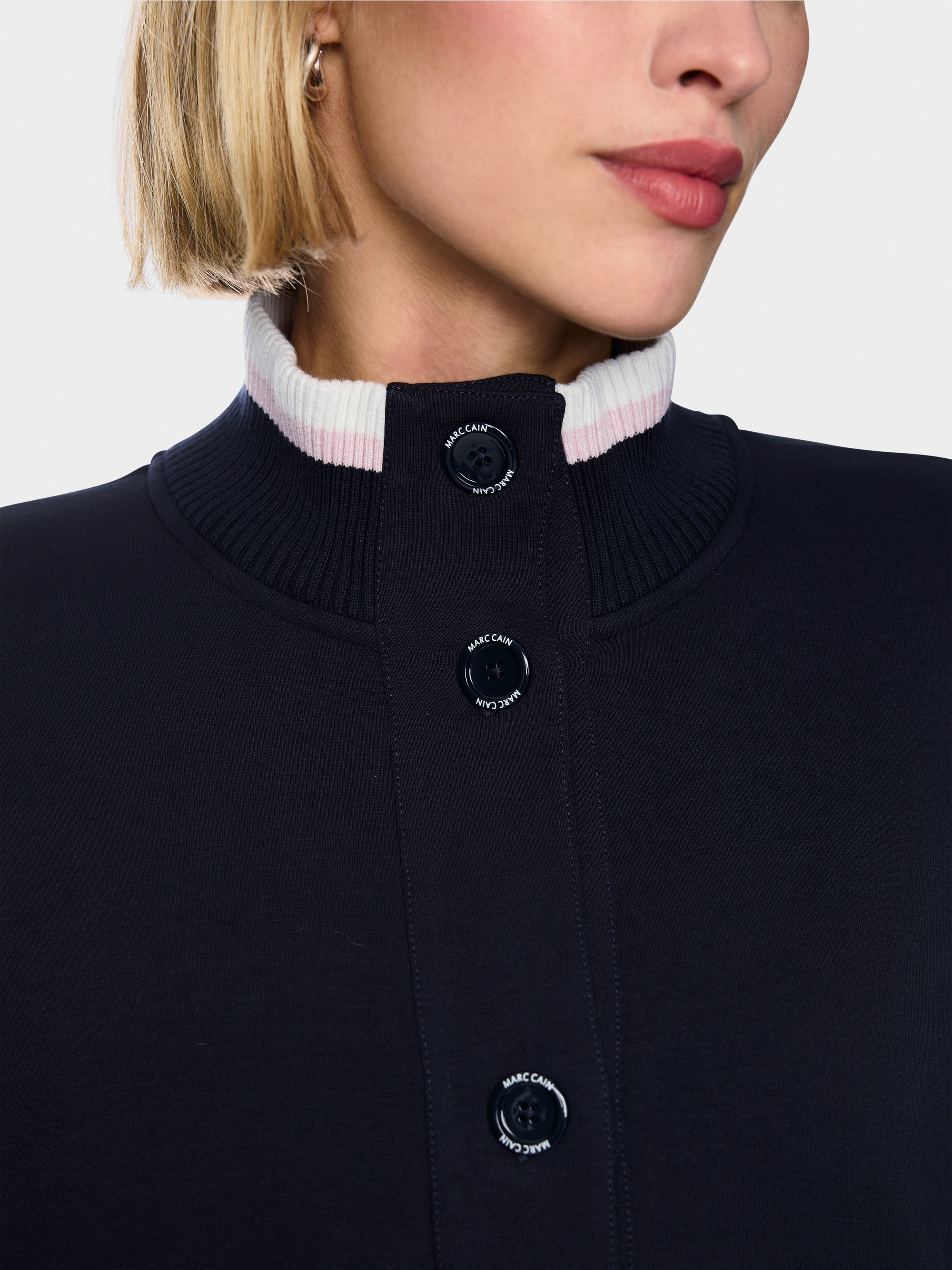 Jacket with knitted details