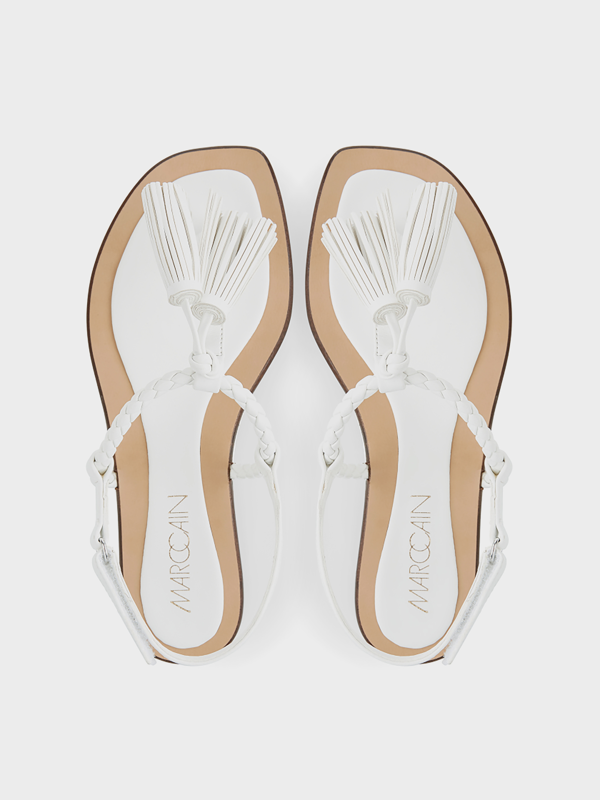 white flat thong sandals