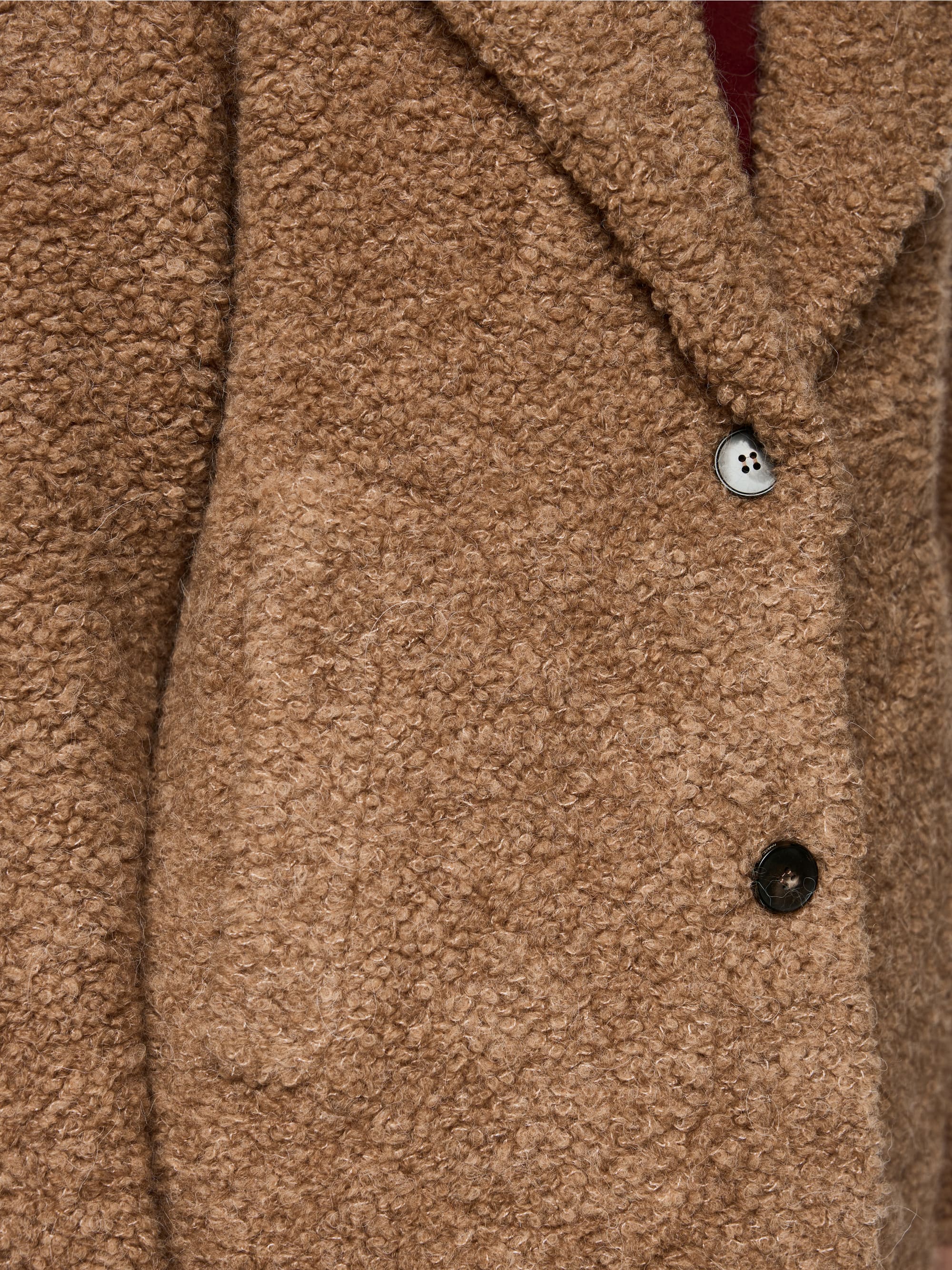 Kort boucléjasje Knitted in Germany