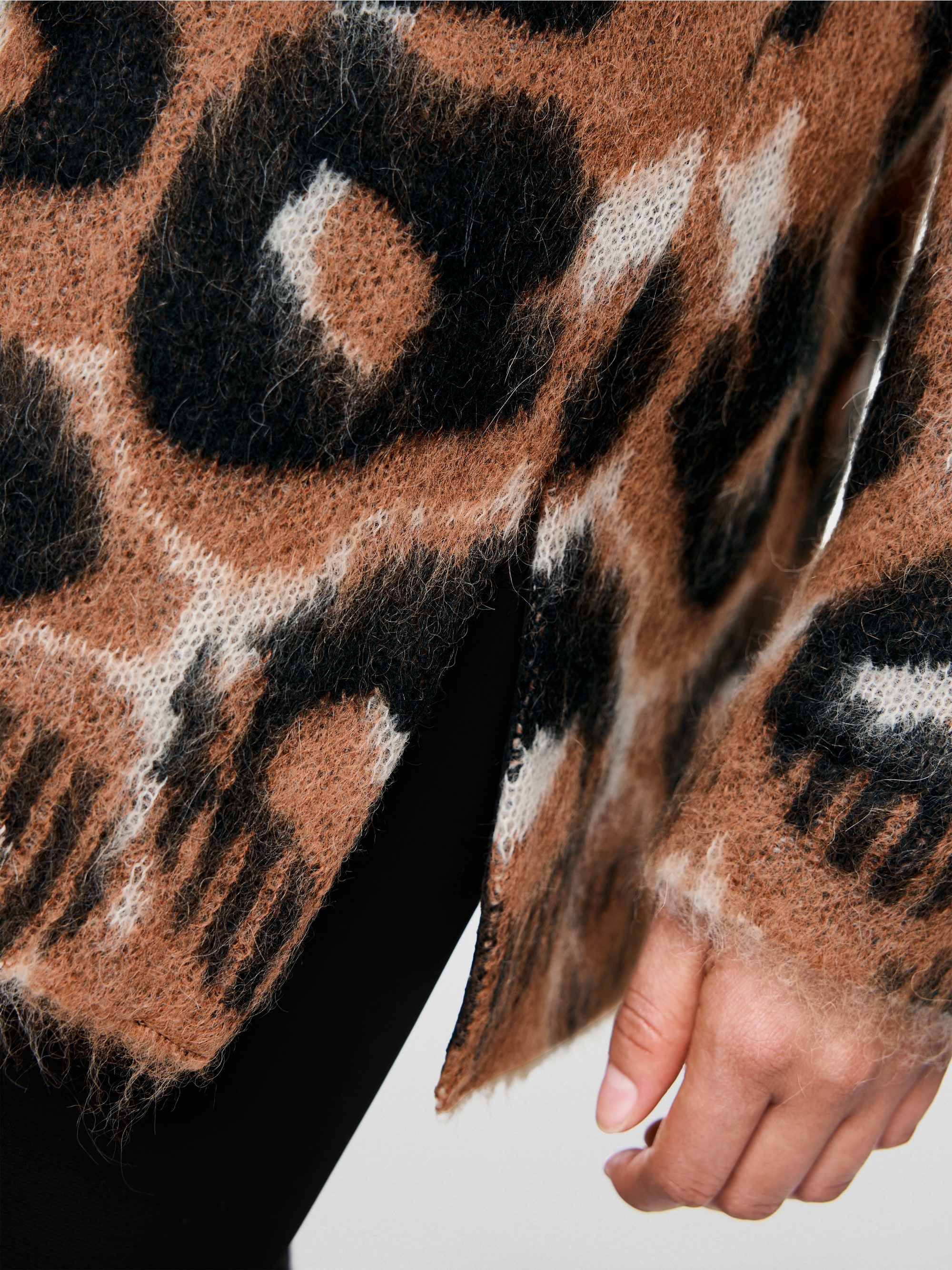 Knitted in Germany leopard print jumper