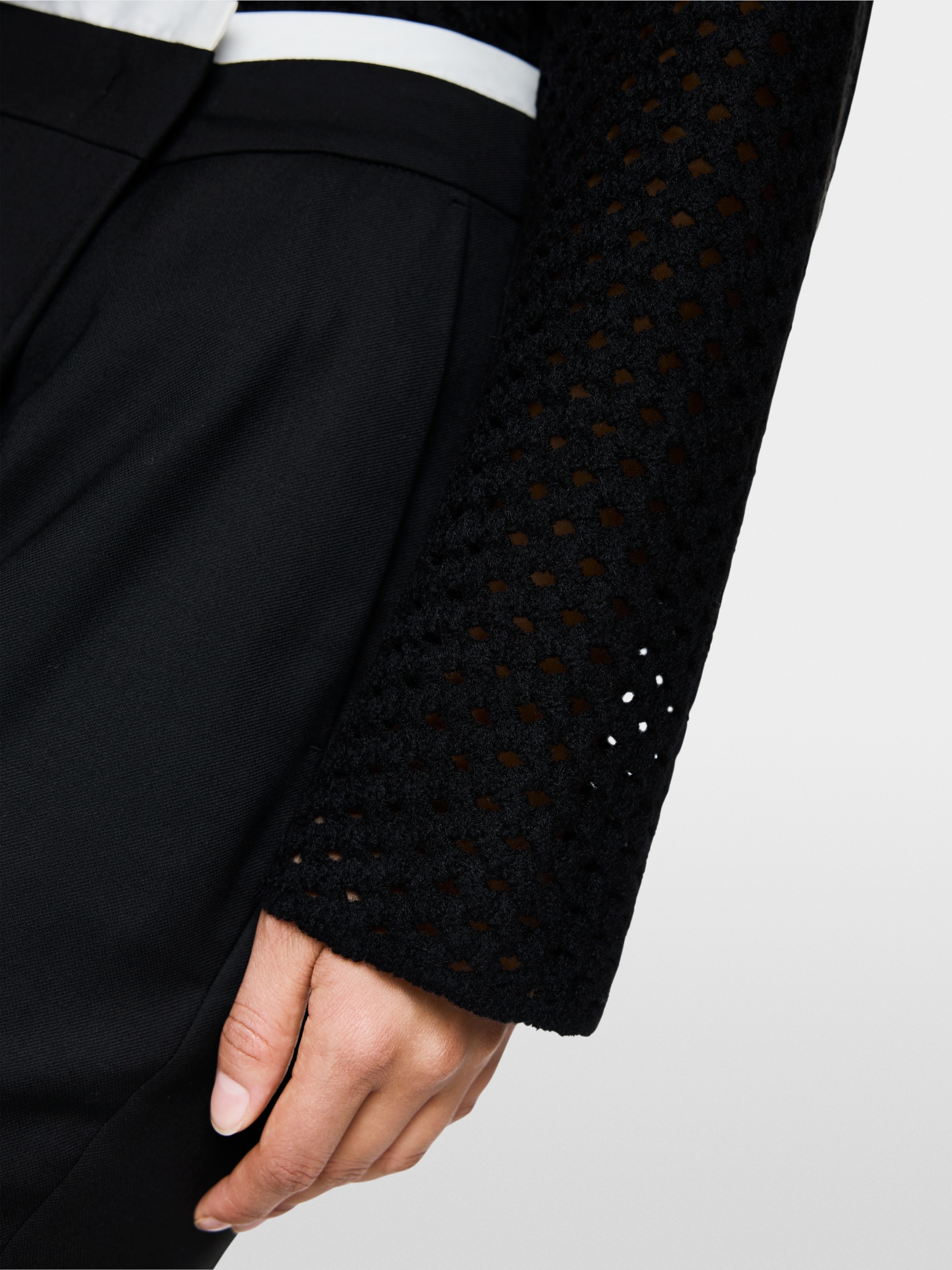 Pull en maille ajourée tricoté en Allemagne