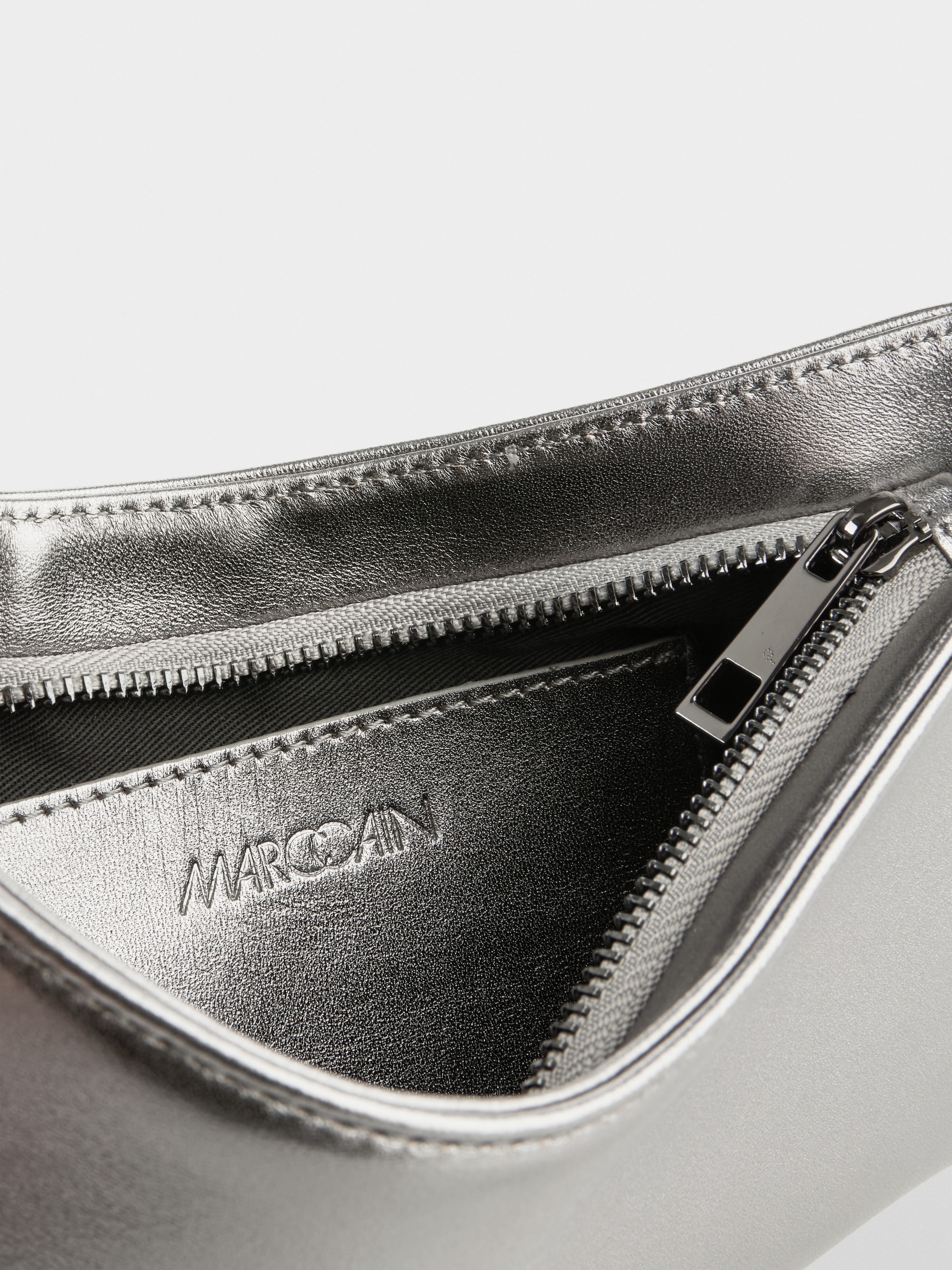 Metallic schoudertas van geitenleer
