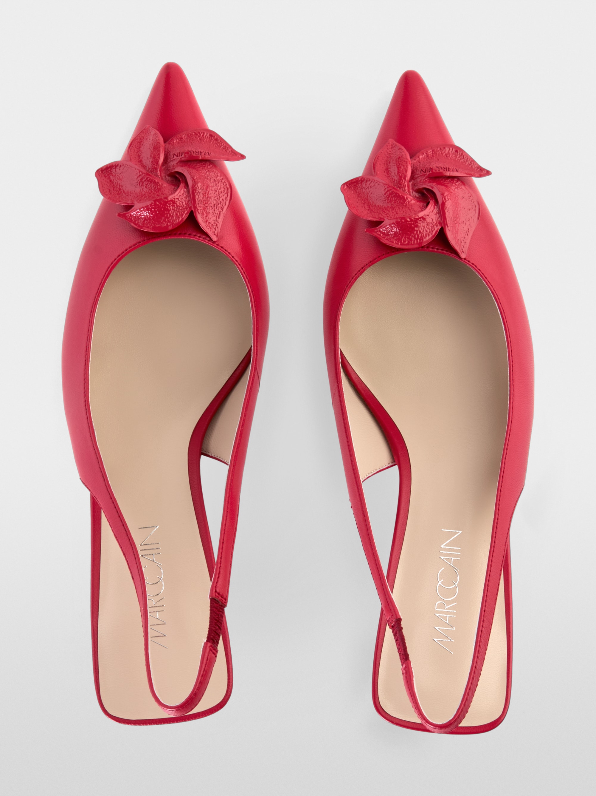 Slingback pumps in calf leather