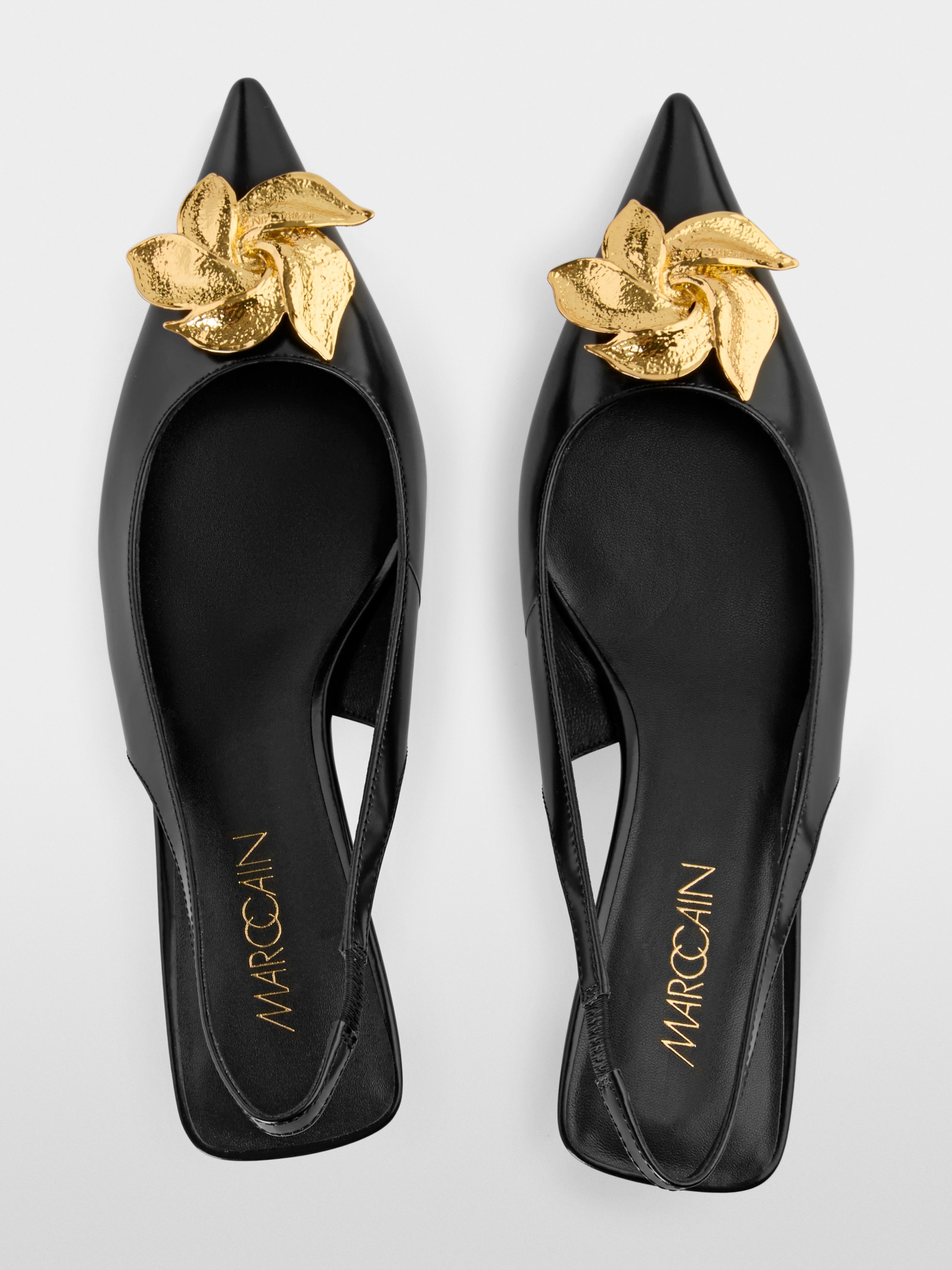 Slingback pumps in calf leather
