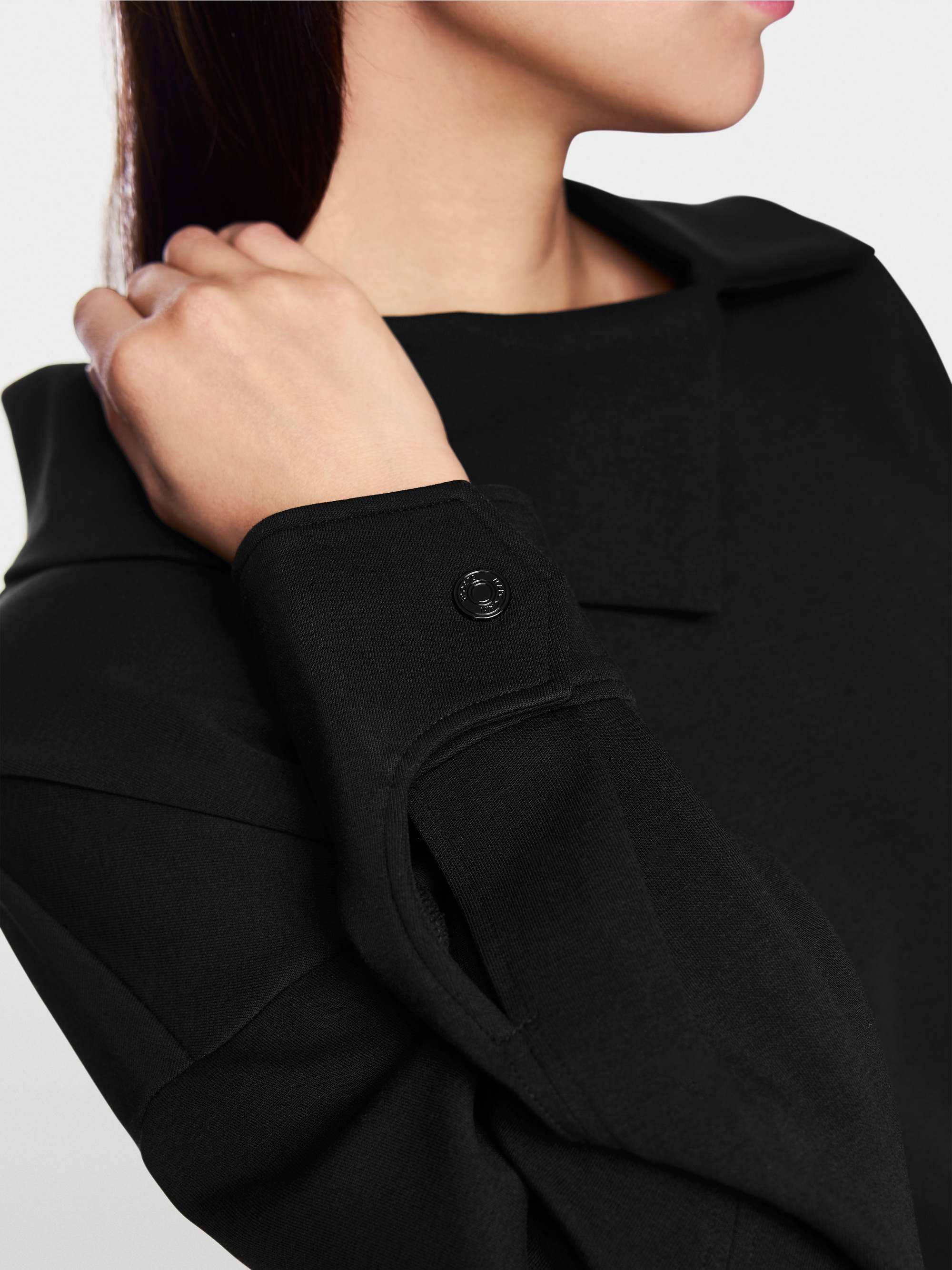 Sweatshirt with asymmetrical collar