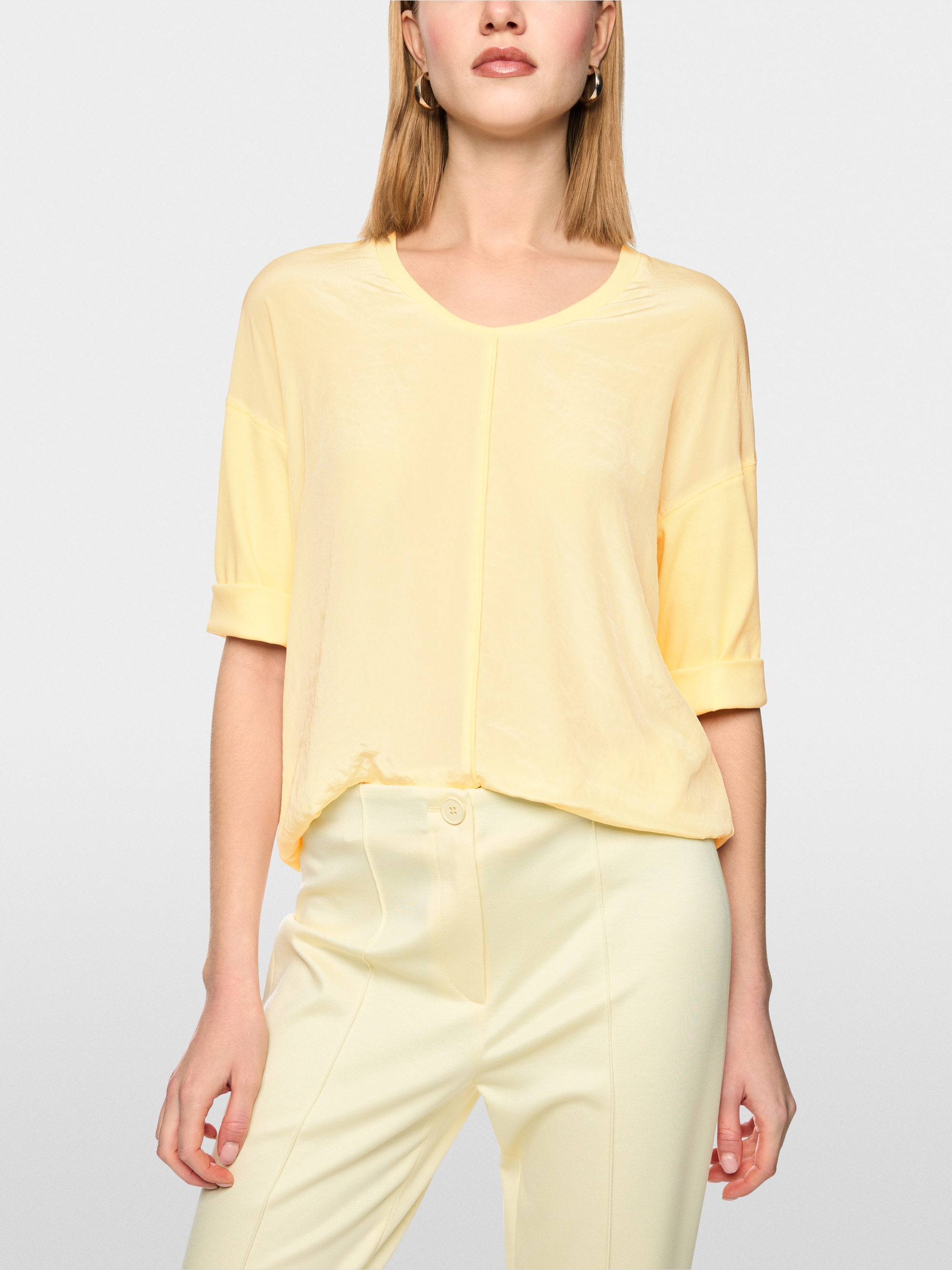 Wide blouse in material mix