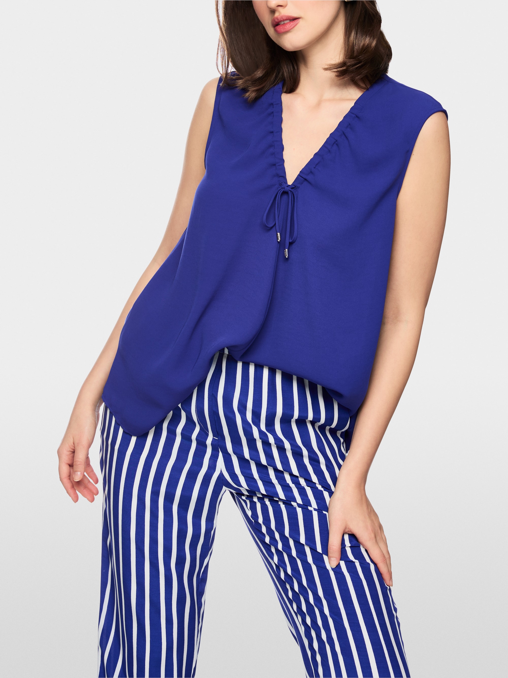 Vibrant top with pleating