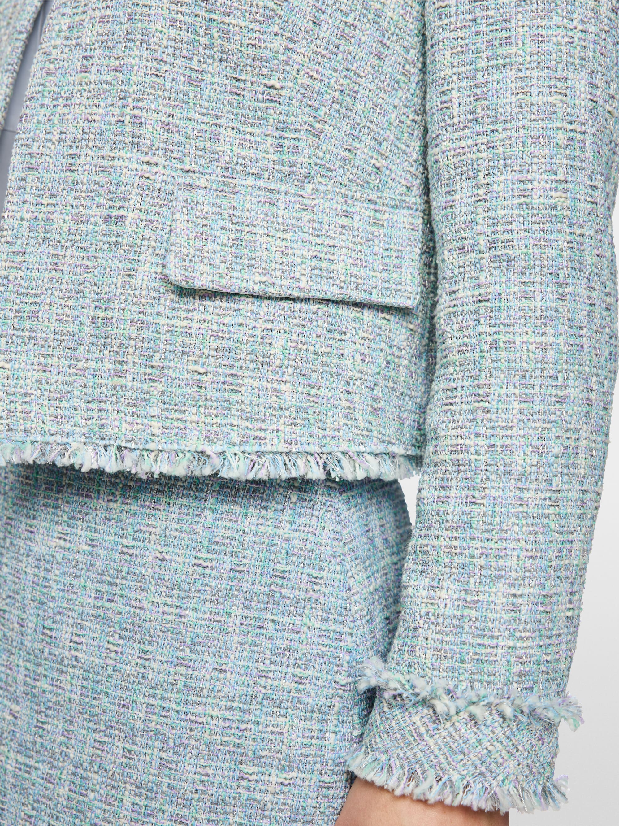 Veste bouclée à franges