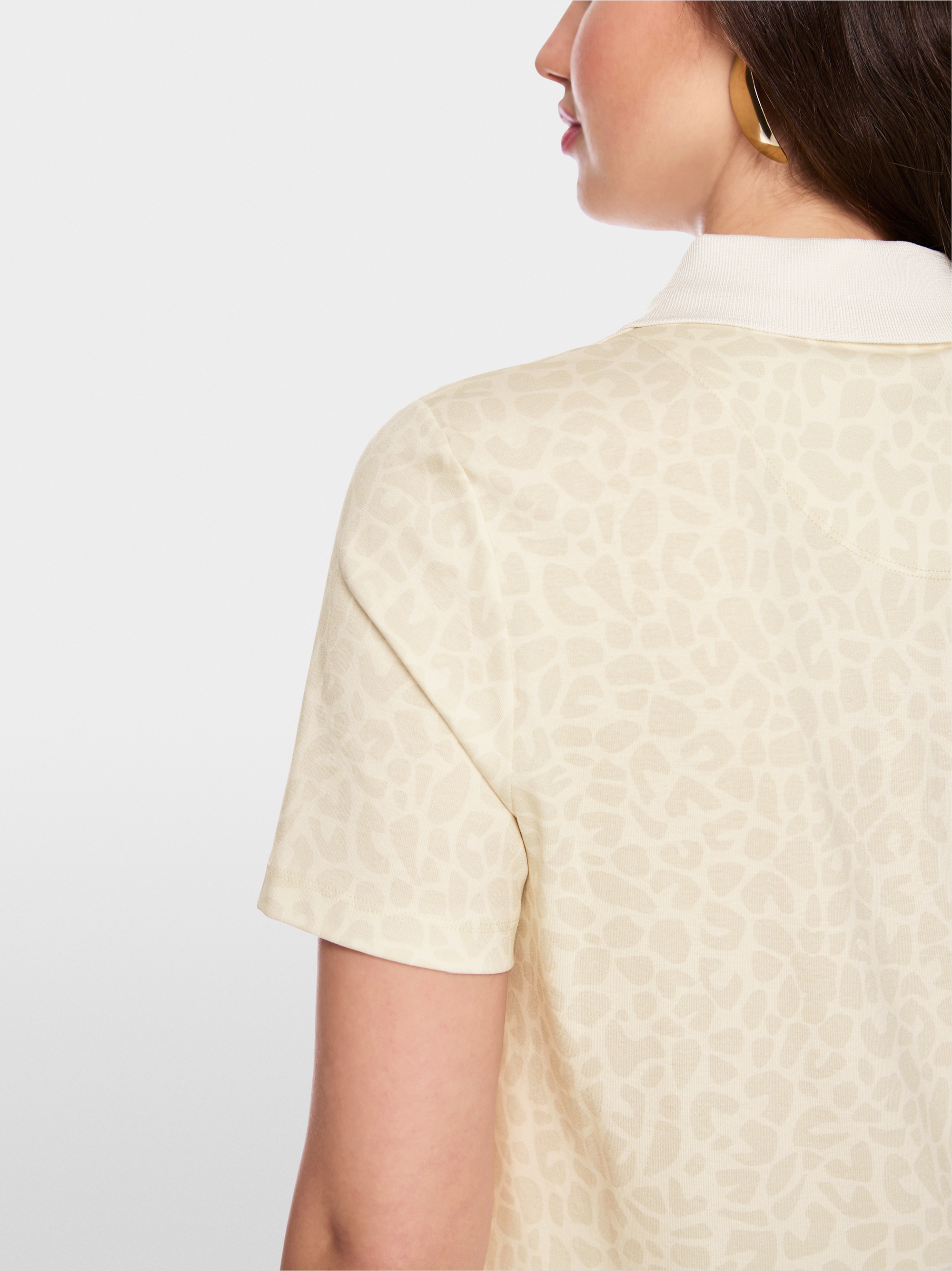 Polo shirt with leopard pattern