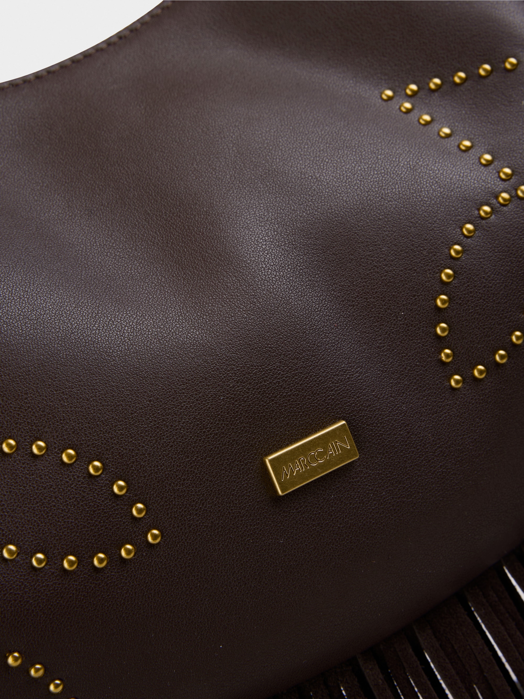 Hobo bag with studs and fringing