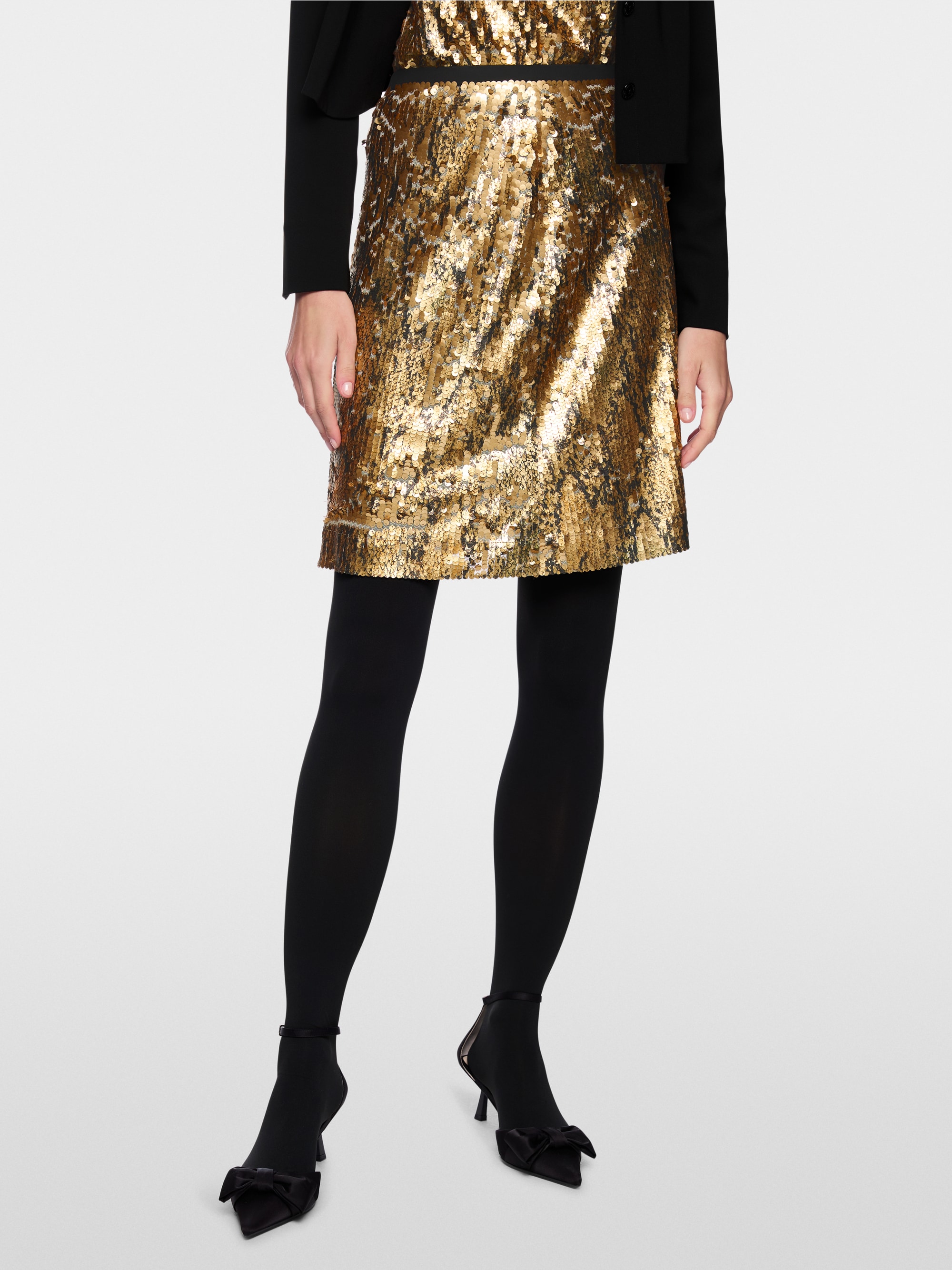 Minirock mit goldenen Pailletten