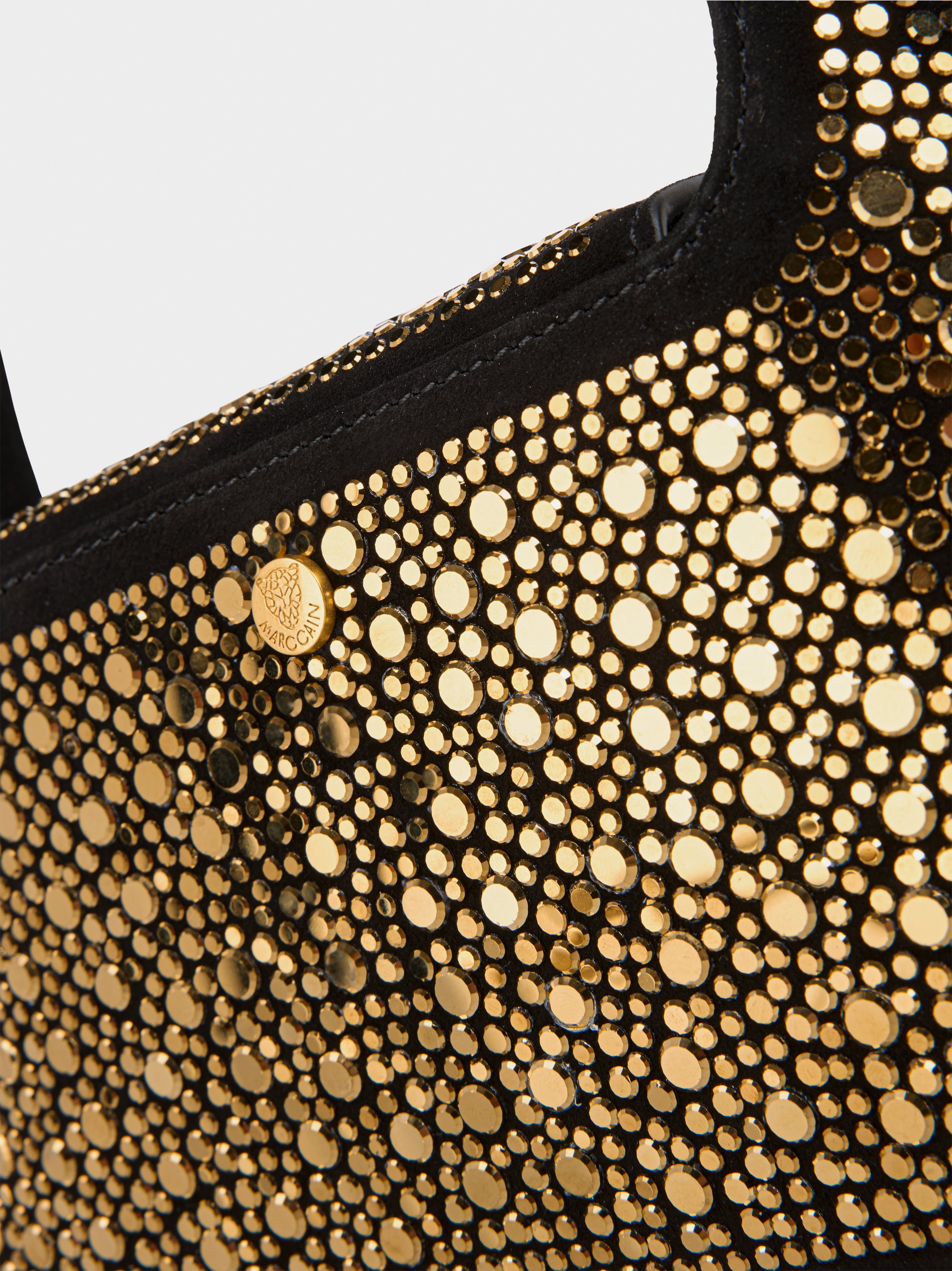 Mini sac exclusif à rivets