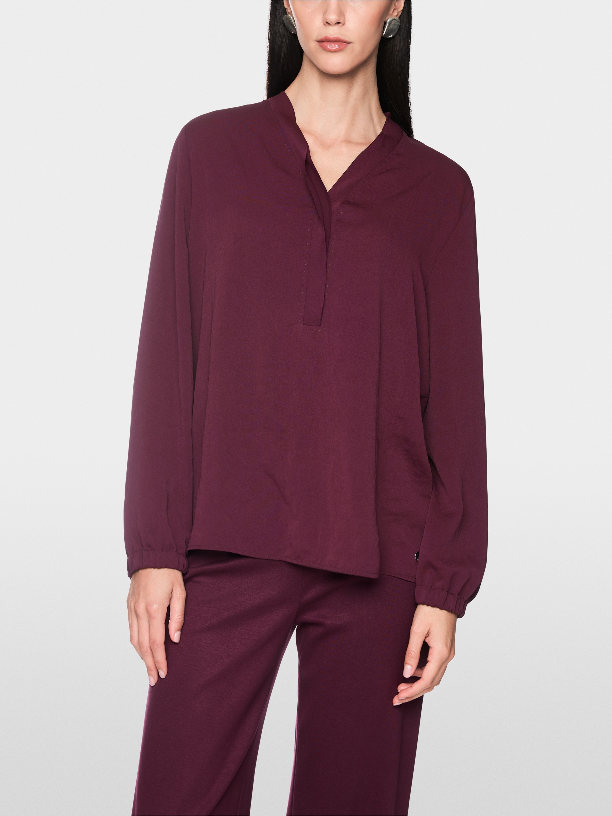 Loose-fitting blouse with V-neck