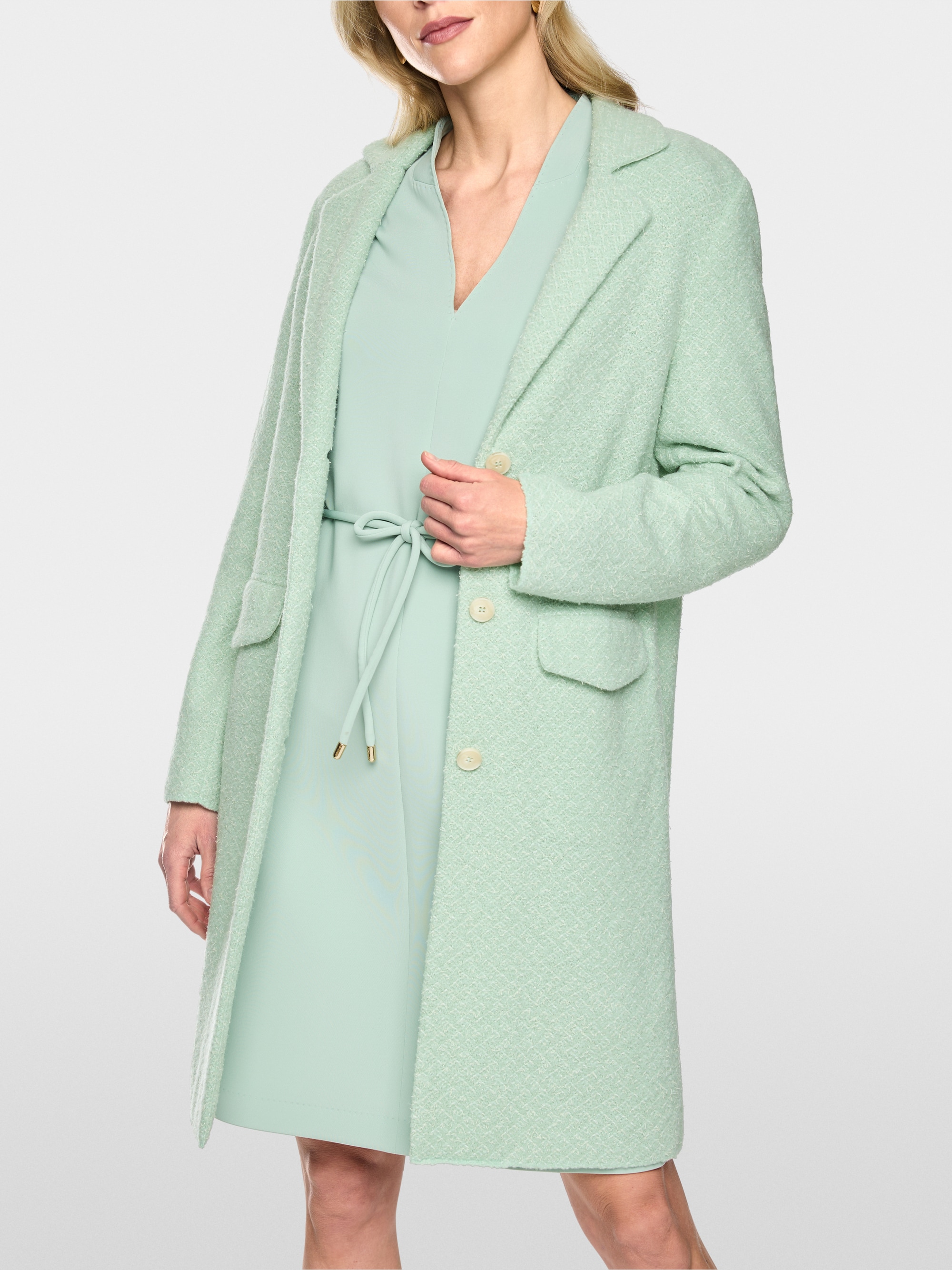 “Knitted in Germany”wool blend coat