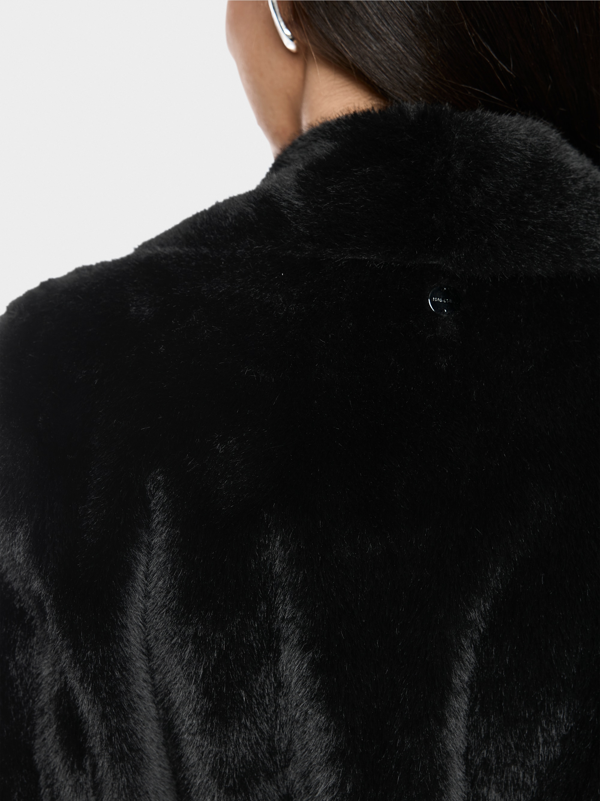 Manteau luxueux en fausse fourrure