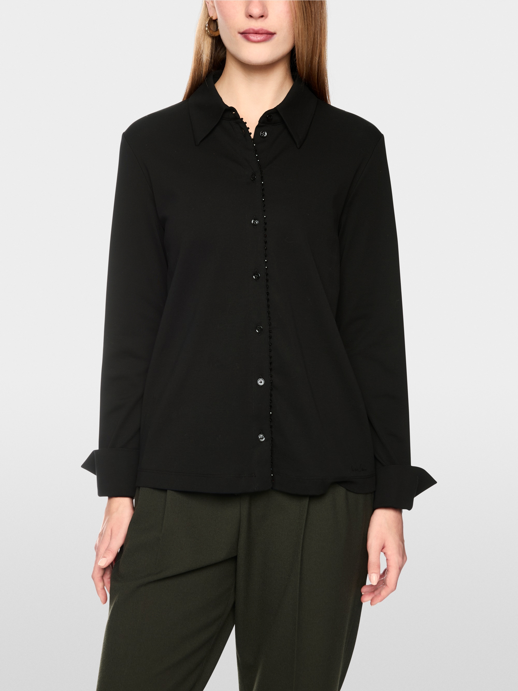 Blouse with glitter buttoning