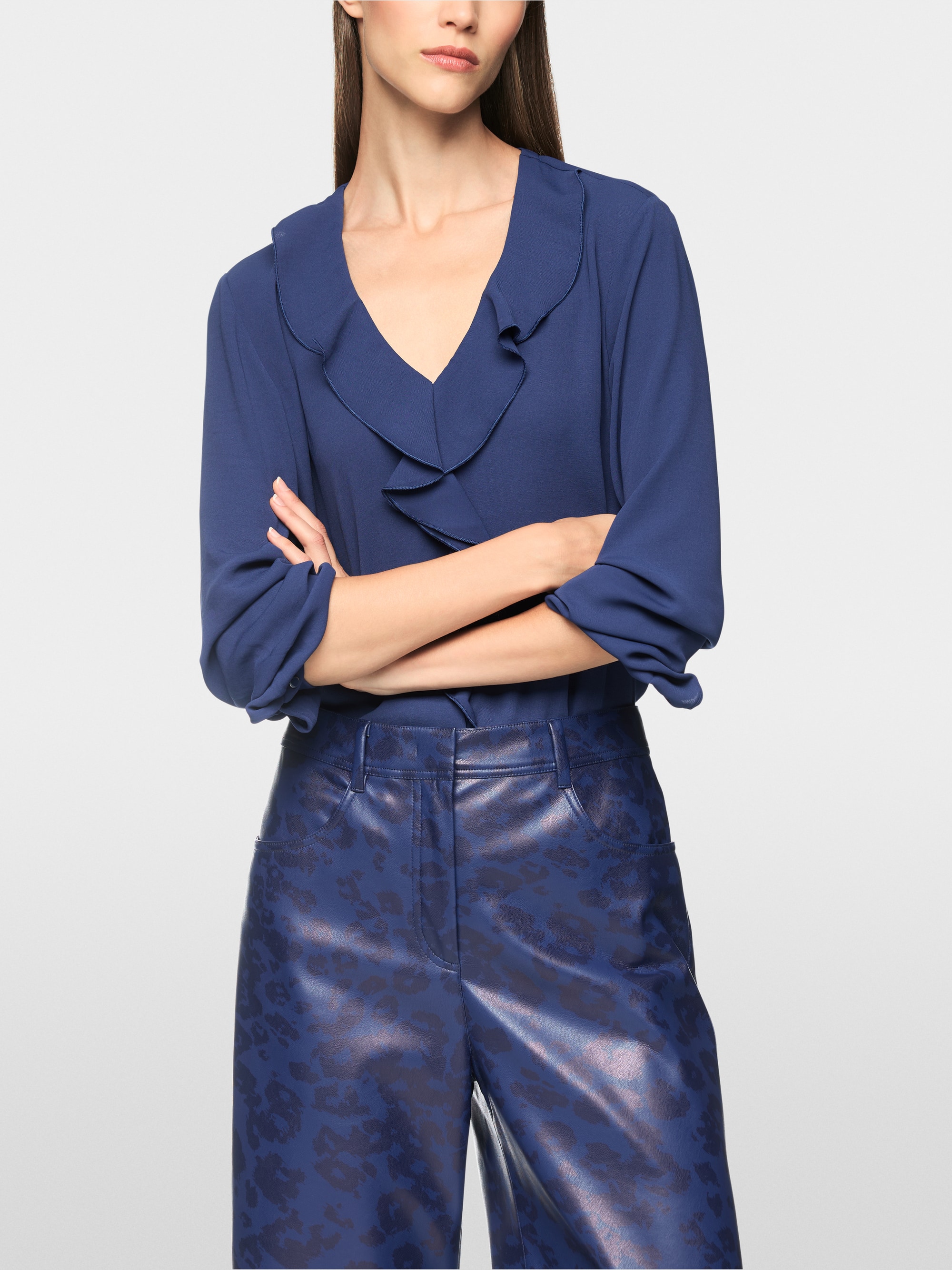 Blouse with flounces