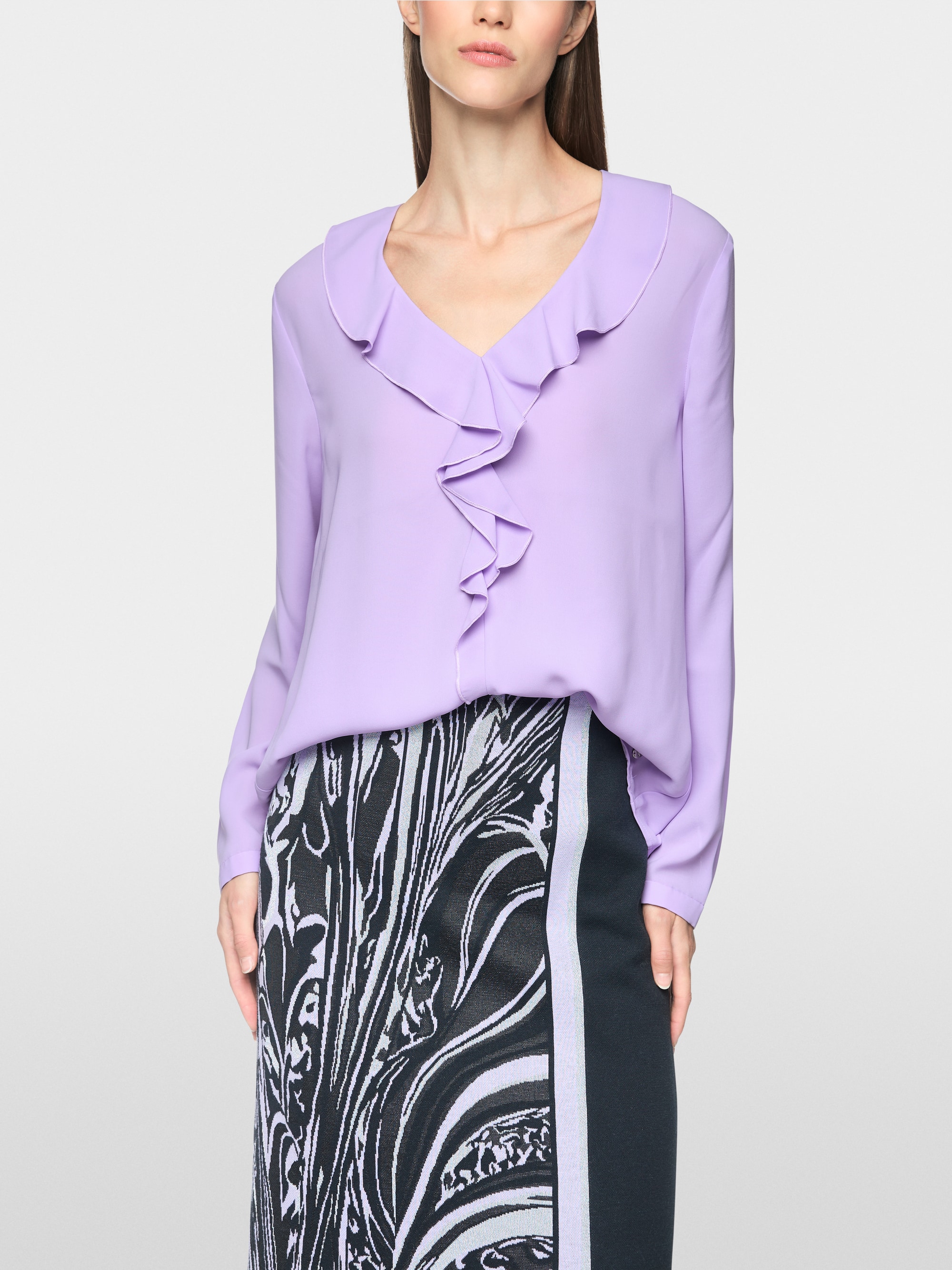 Blouse with flounces