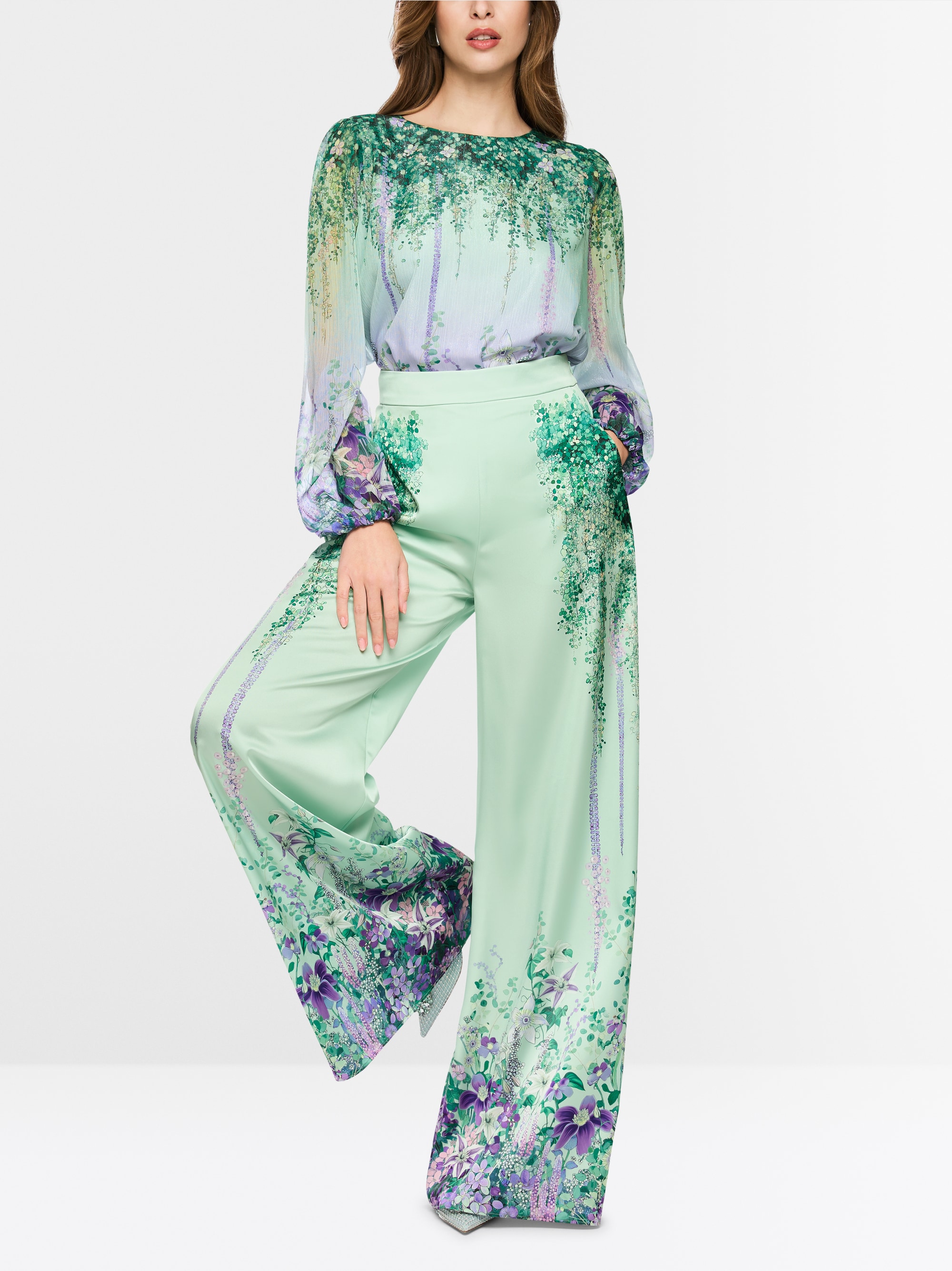 Tunic blouse with elasticated cuffs