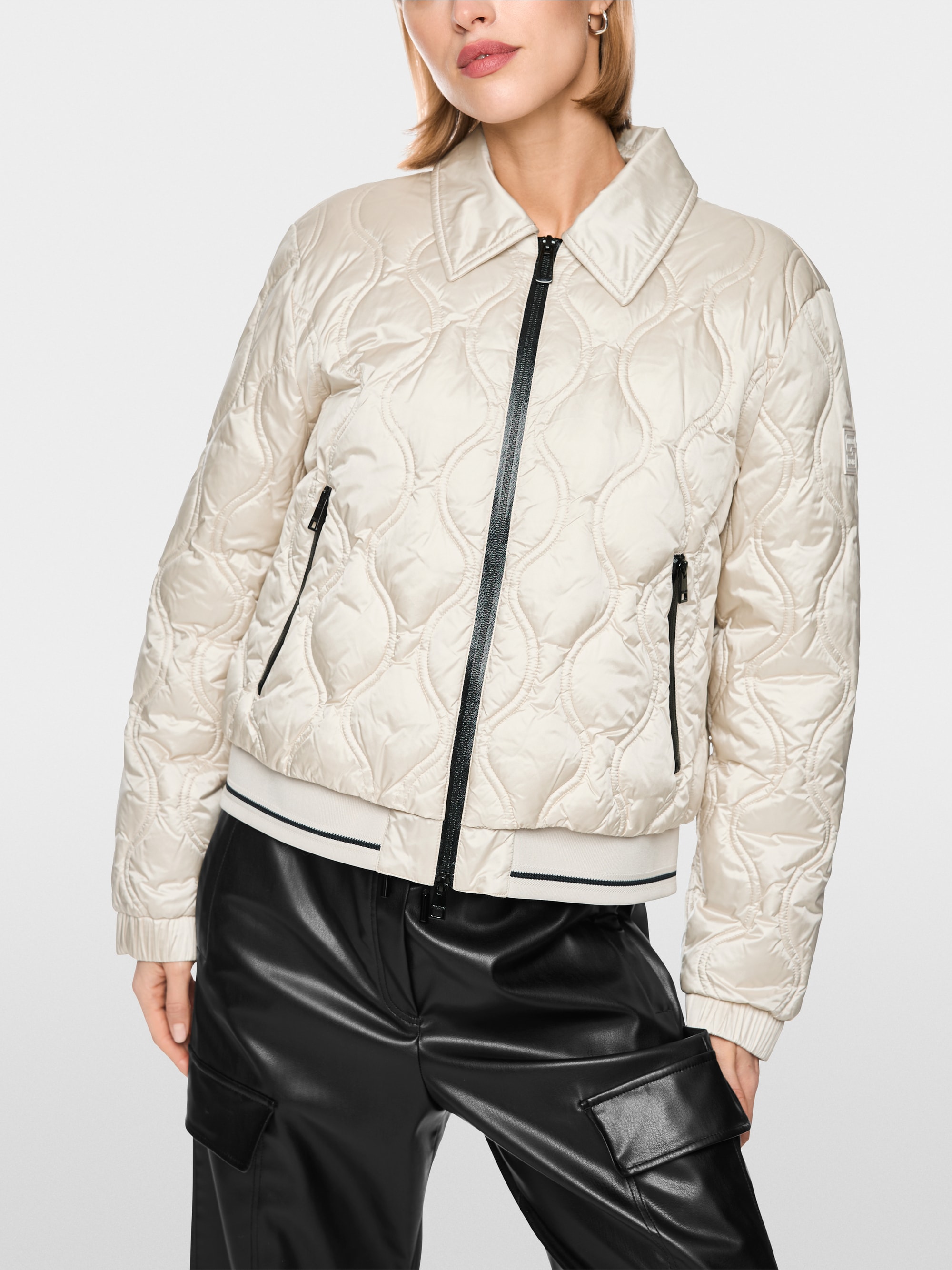 Veste matelassée avec détails contrastés