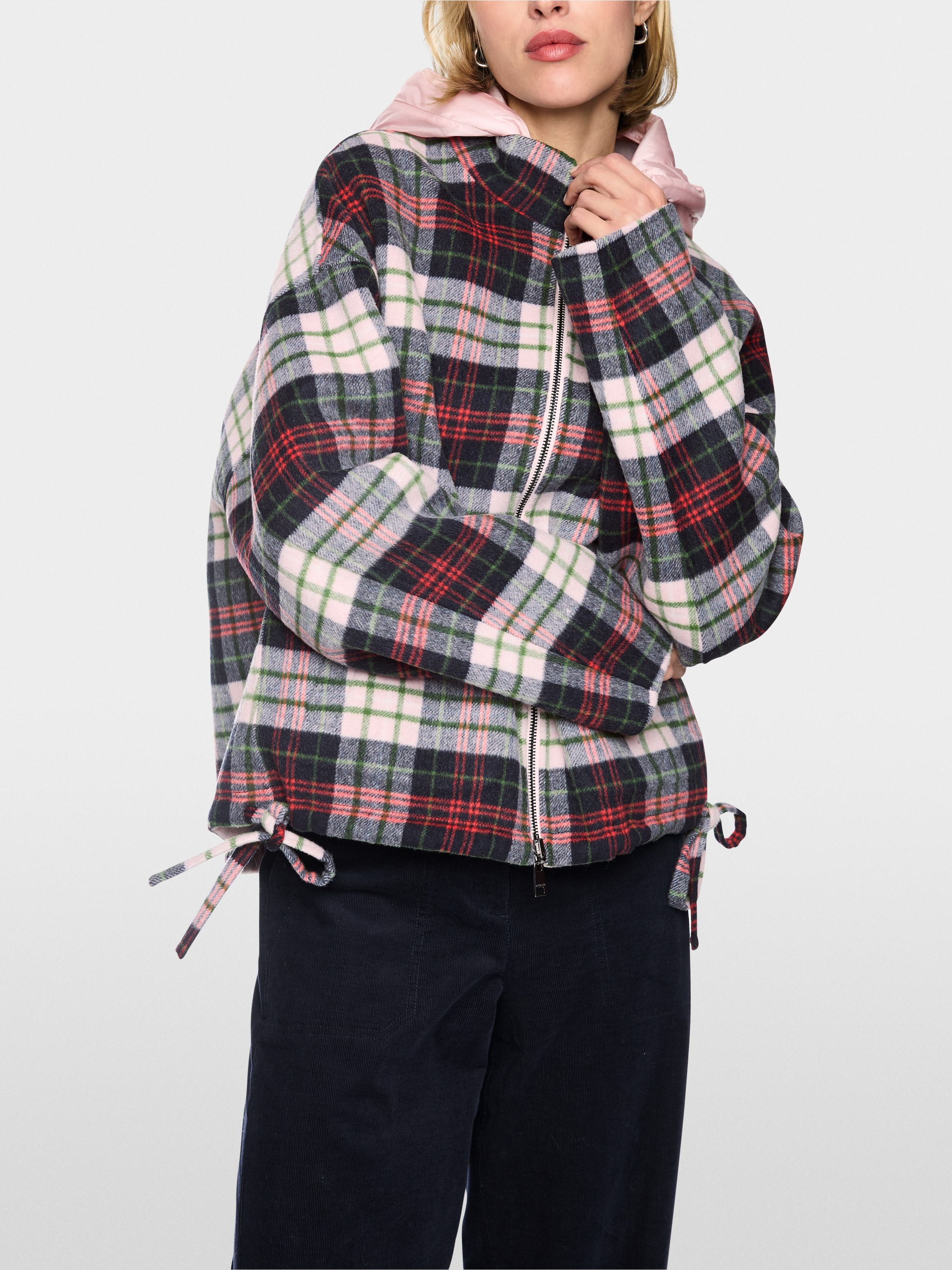 Reversible jacket with quilted hood