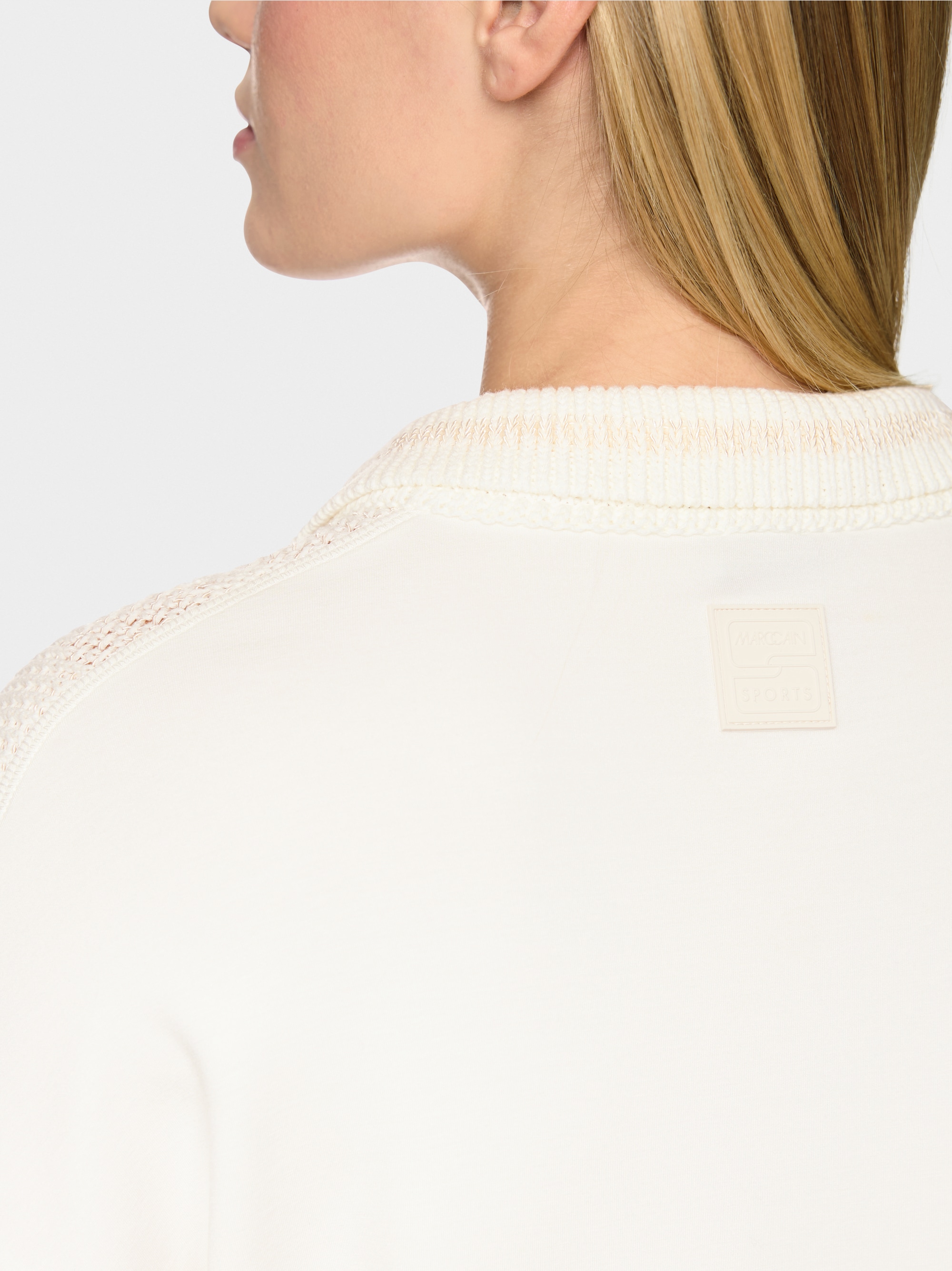 ‘Knitted in Germany’ V-neck jumper