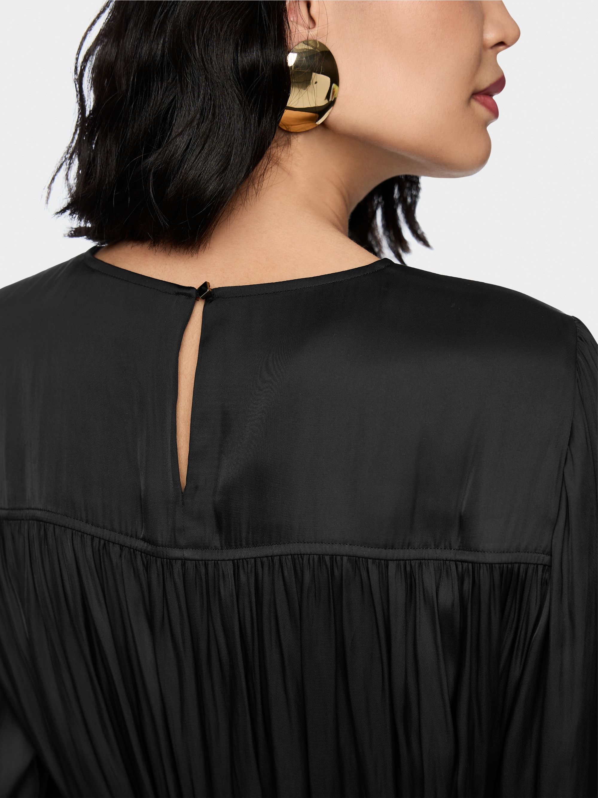 Mini-jurk met volants en riem