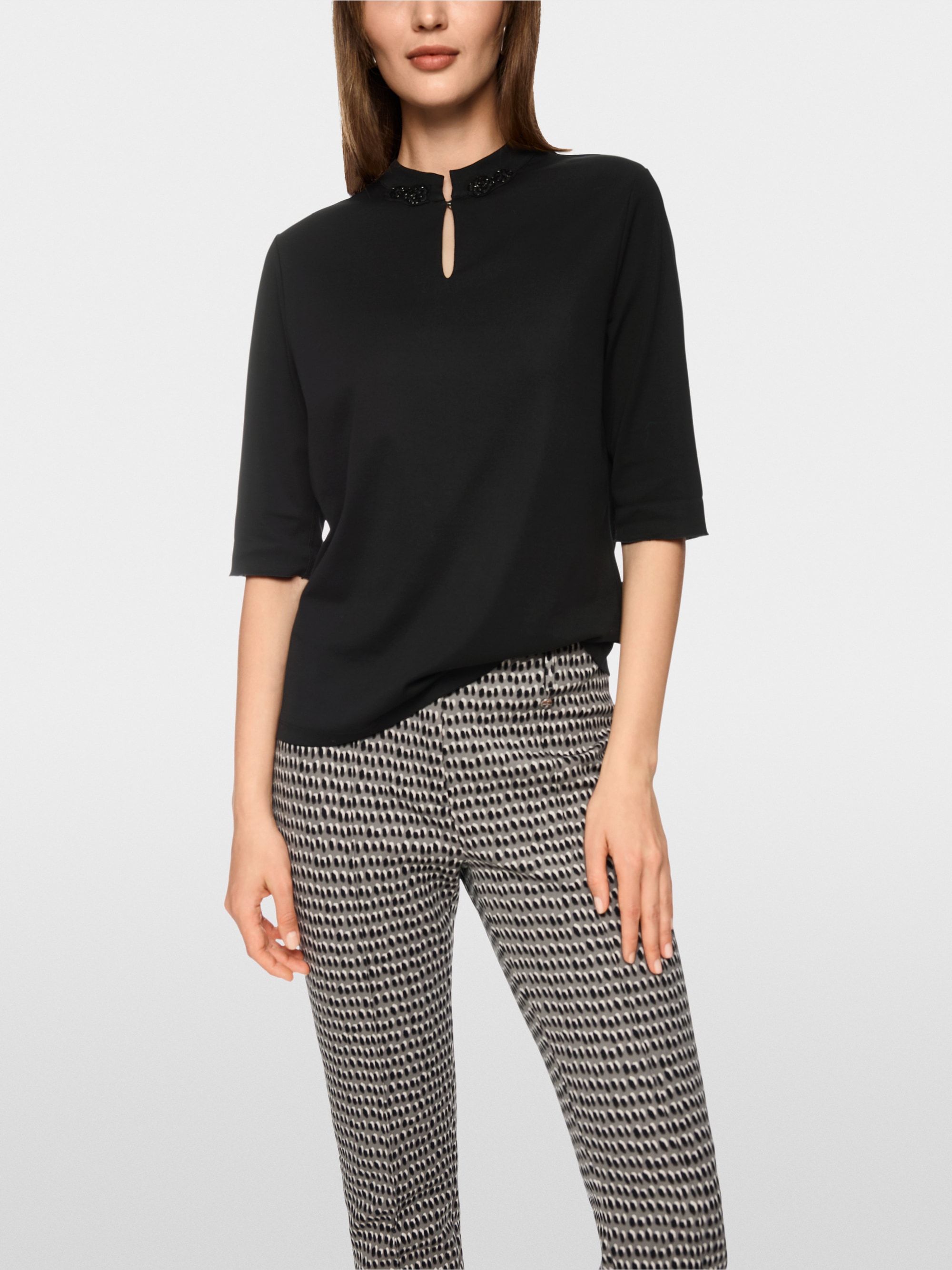 T-shirt avec fleurs scintillantes