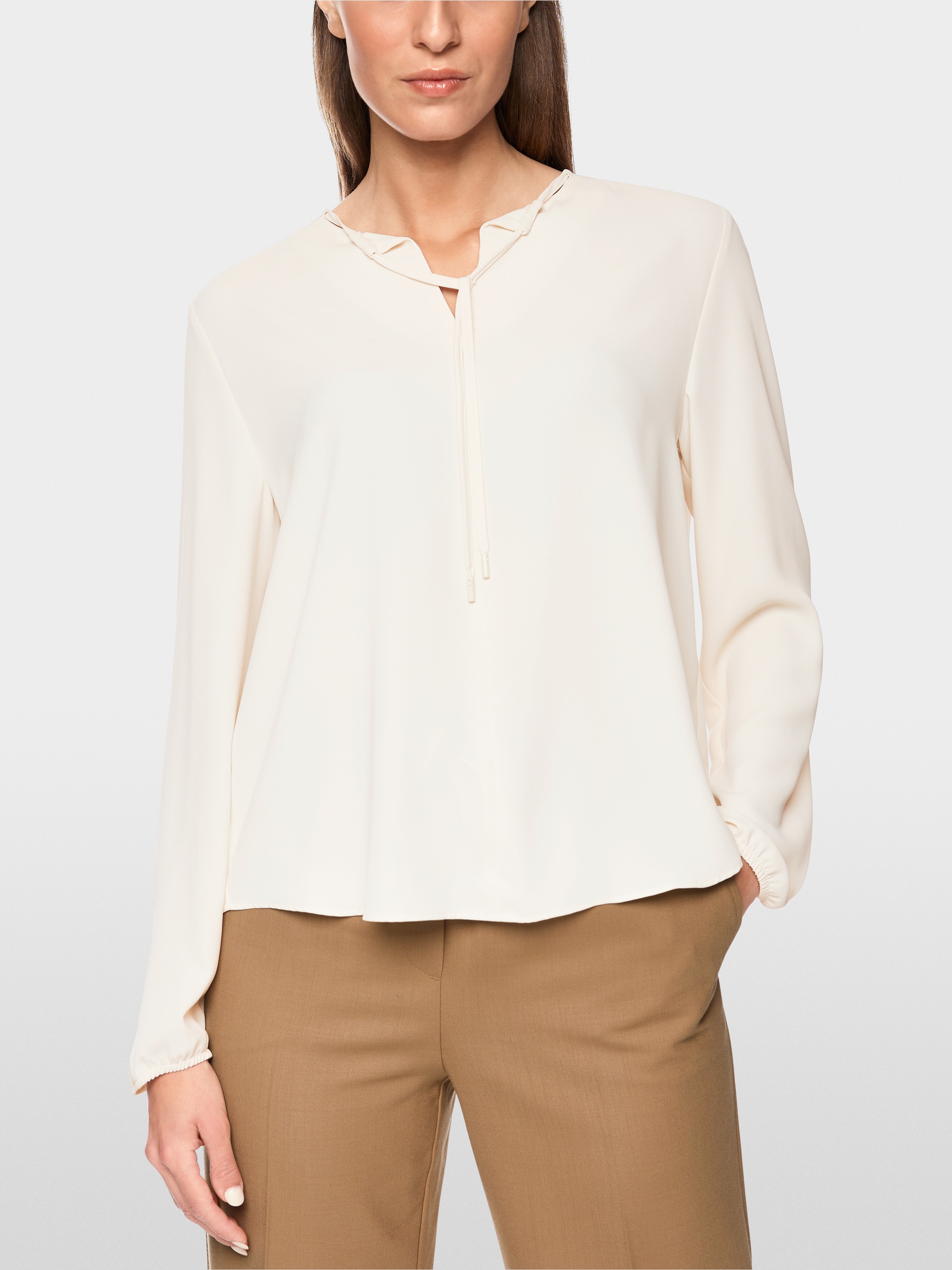 Flowing slip-on blouse with bow
