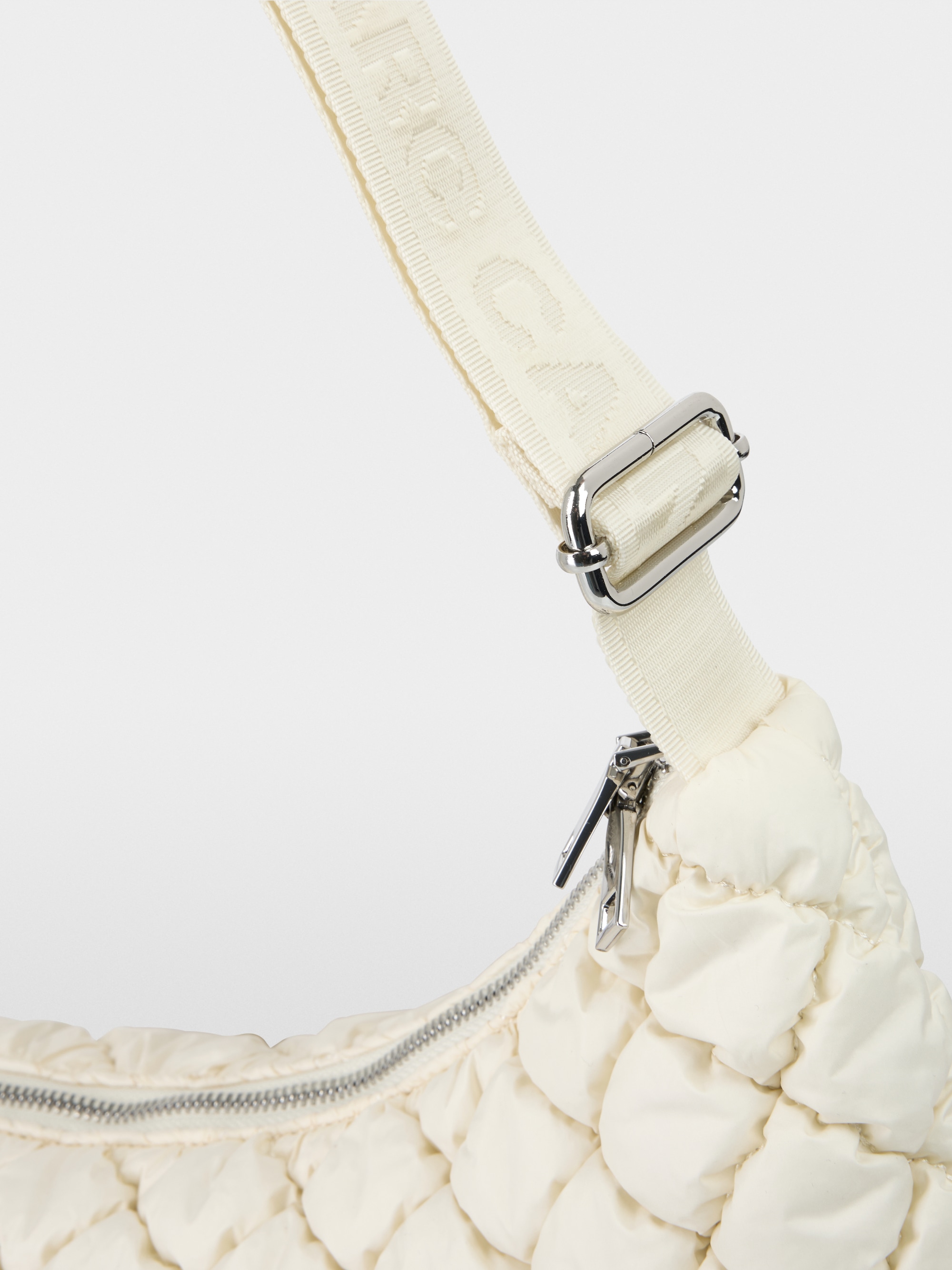 Half-moon quilted design shoulder bag