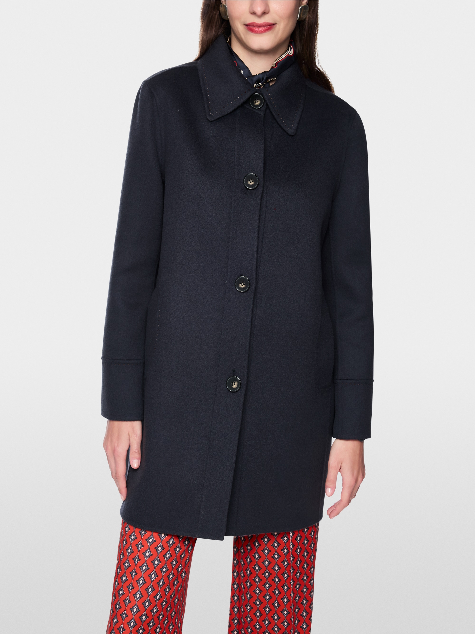 Wool coat with decorative stitching