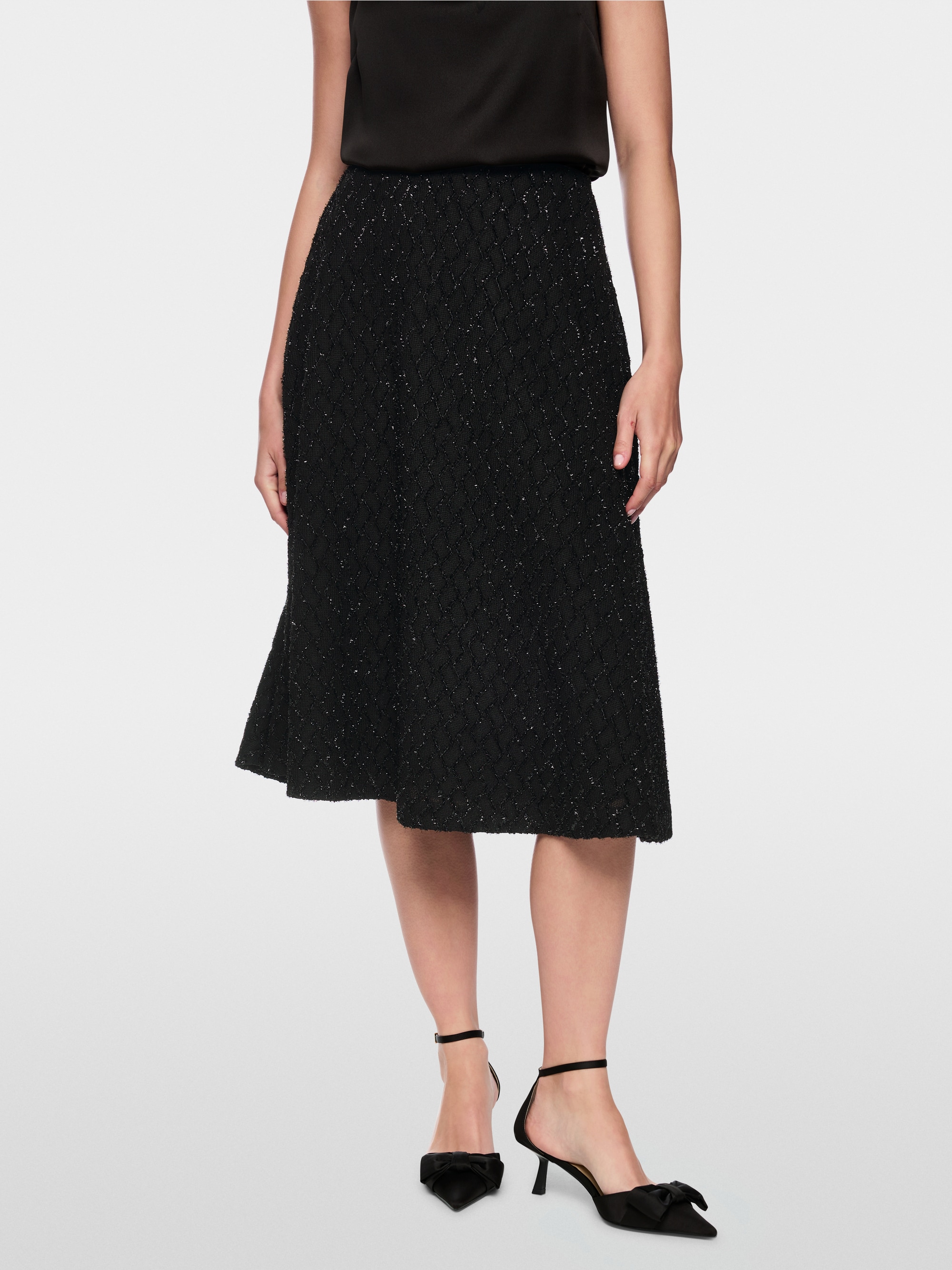 Swinging skirt with glitter details