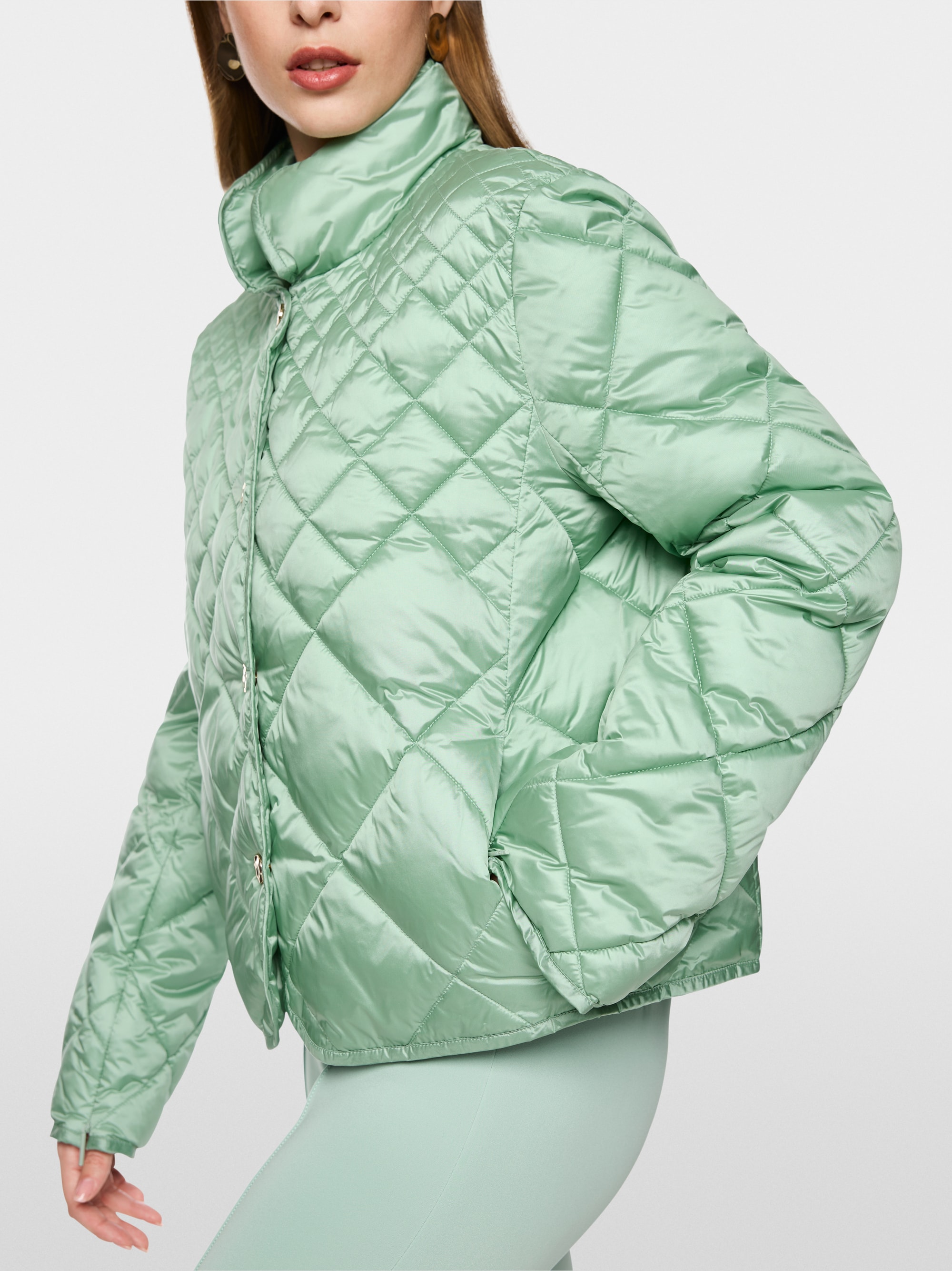 Veste matelassée à boutons décoratifs