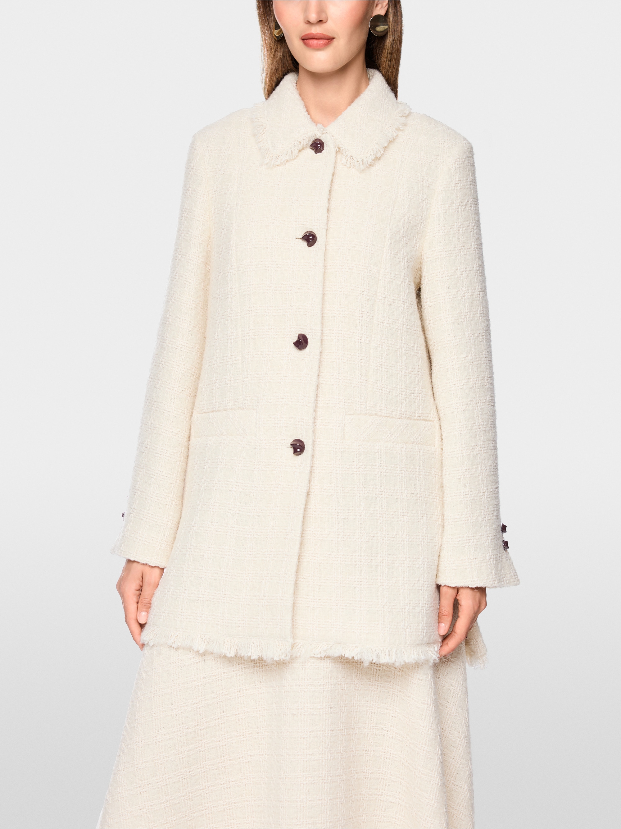 Bouclé jacket with fringing