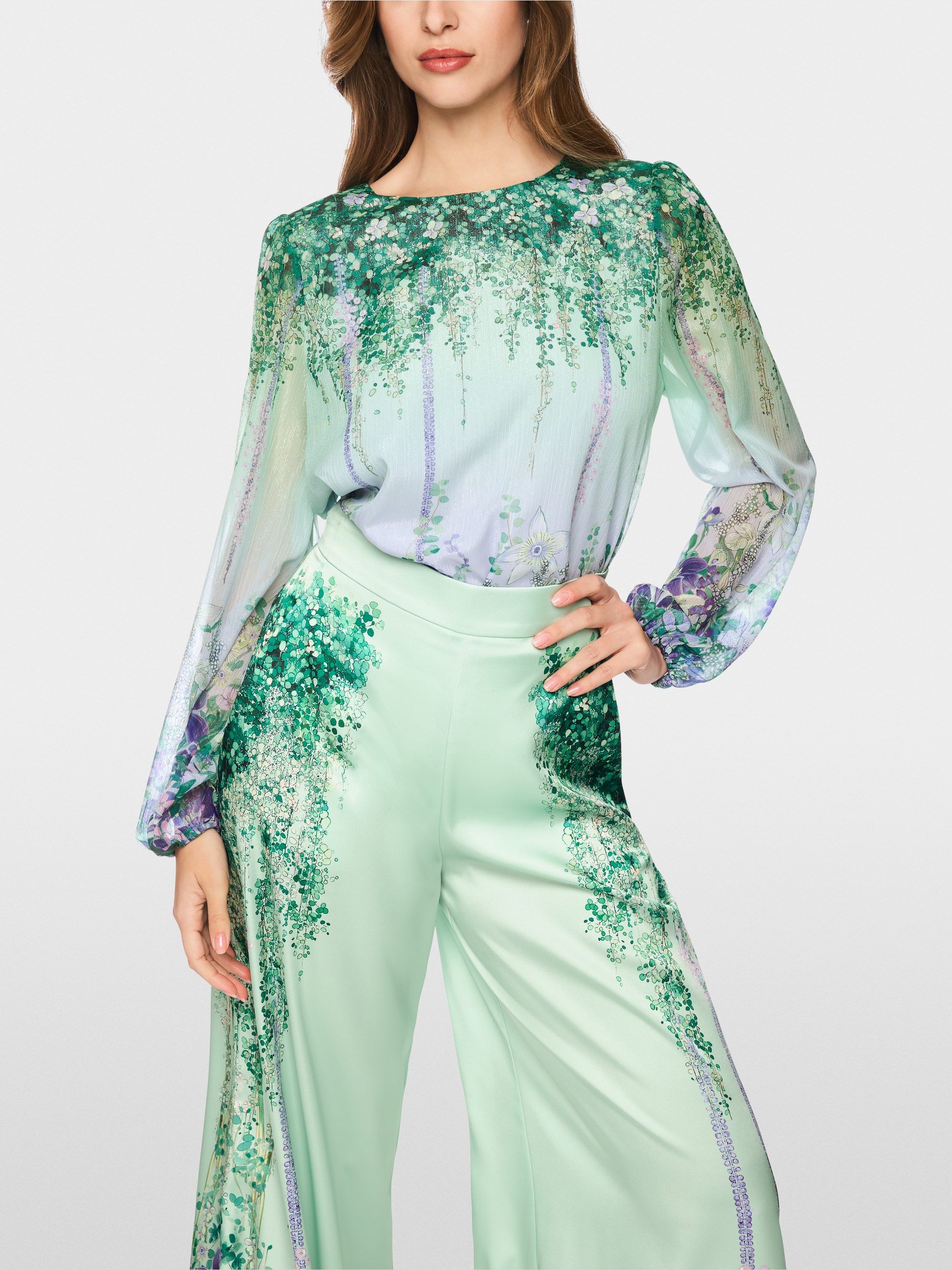 Tunic blouse with elasticated cuffs