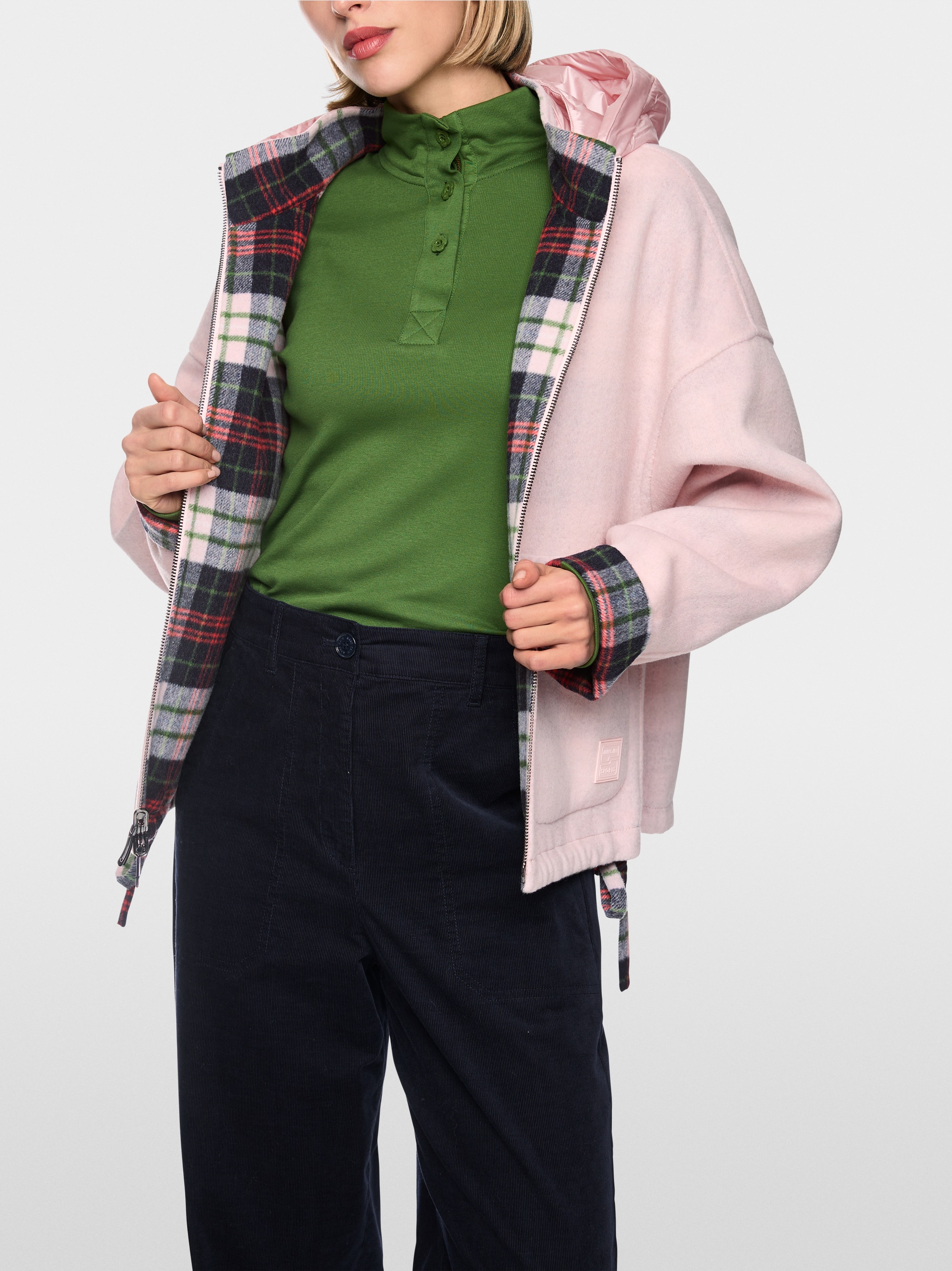Reversible jacket with quilted hood