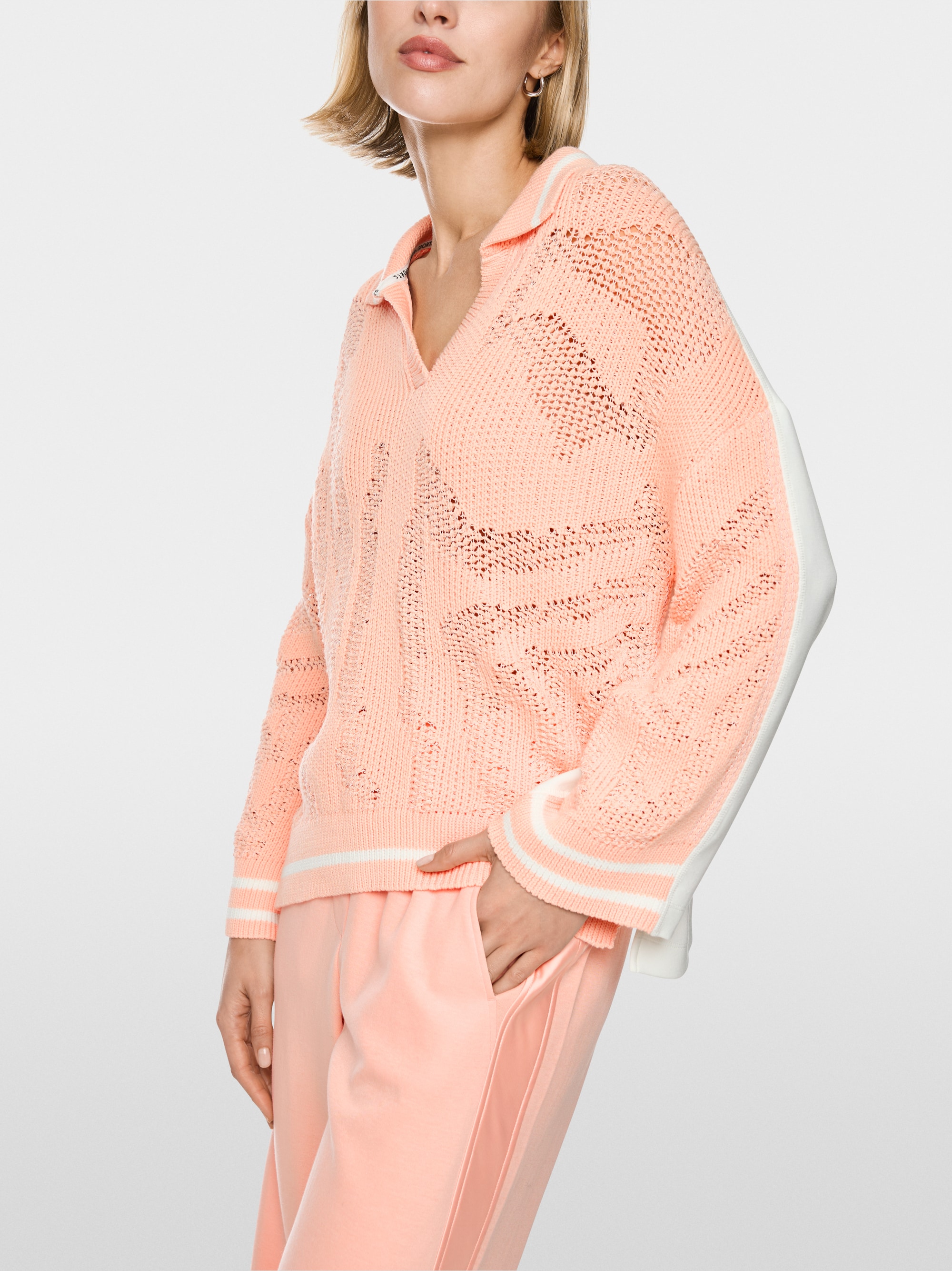‘Knitted in Germany’ V-neck jumper