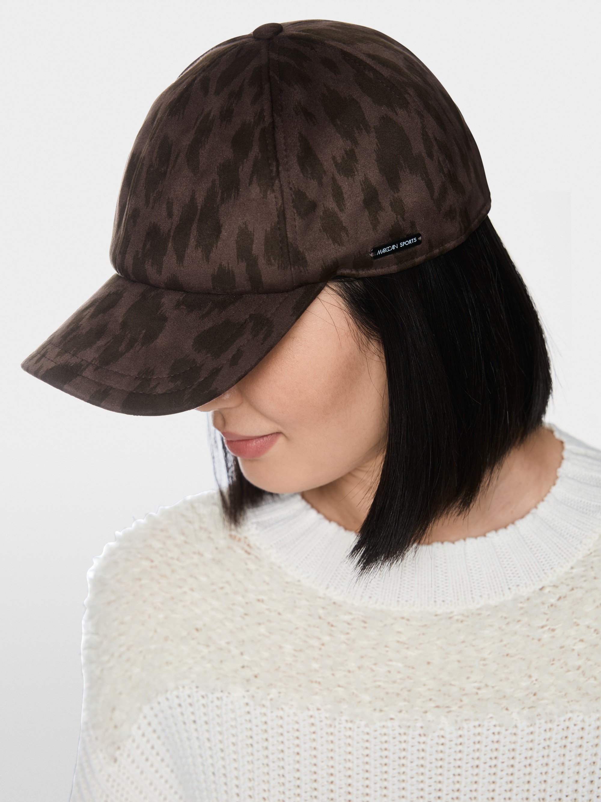 Leopard print cap with adjustable strap