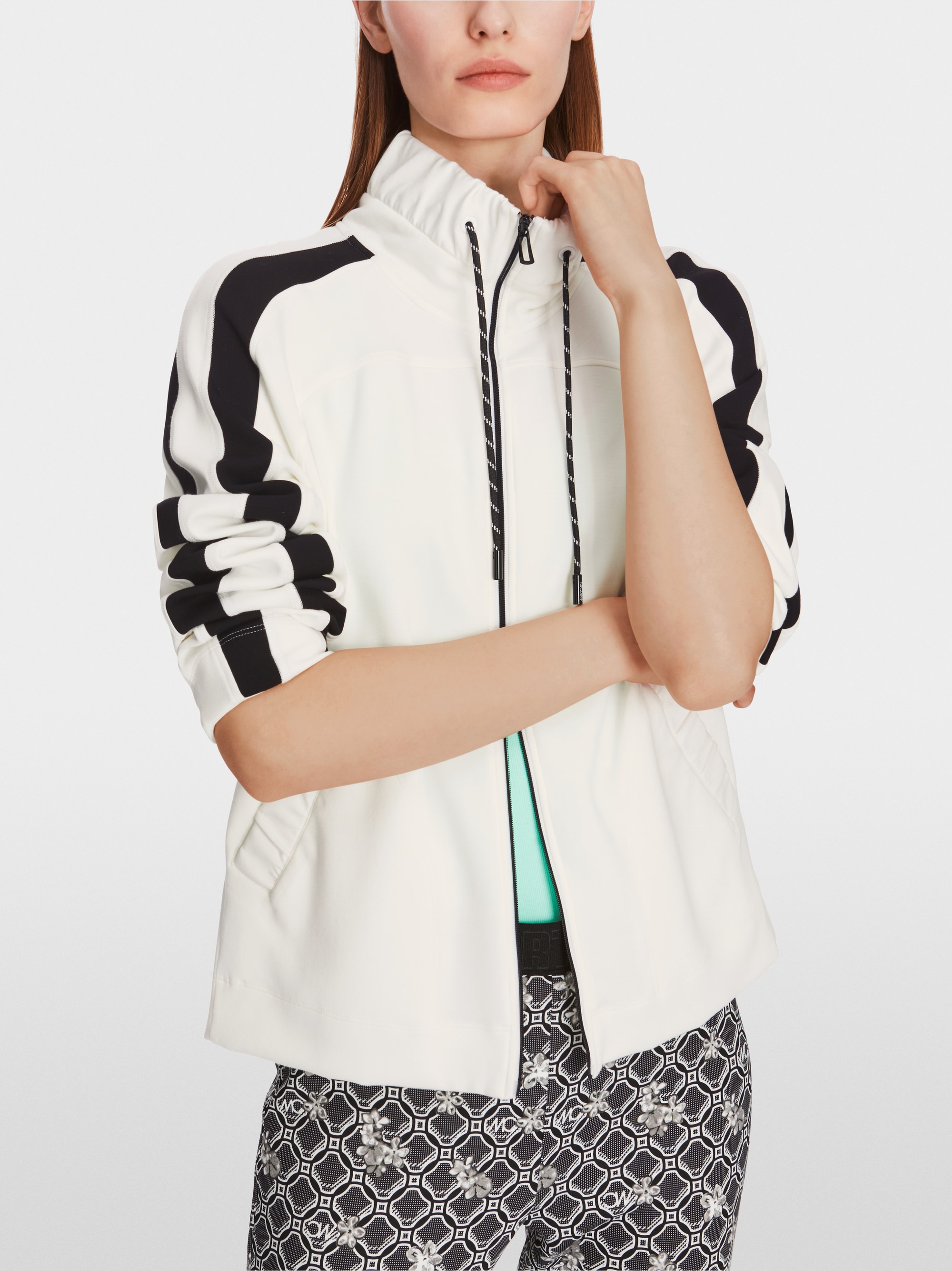 Veste zippée avec col à volants