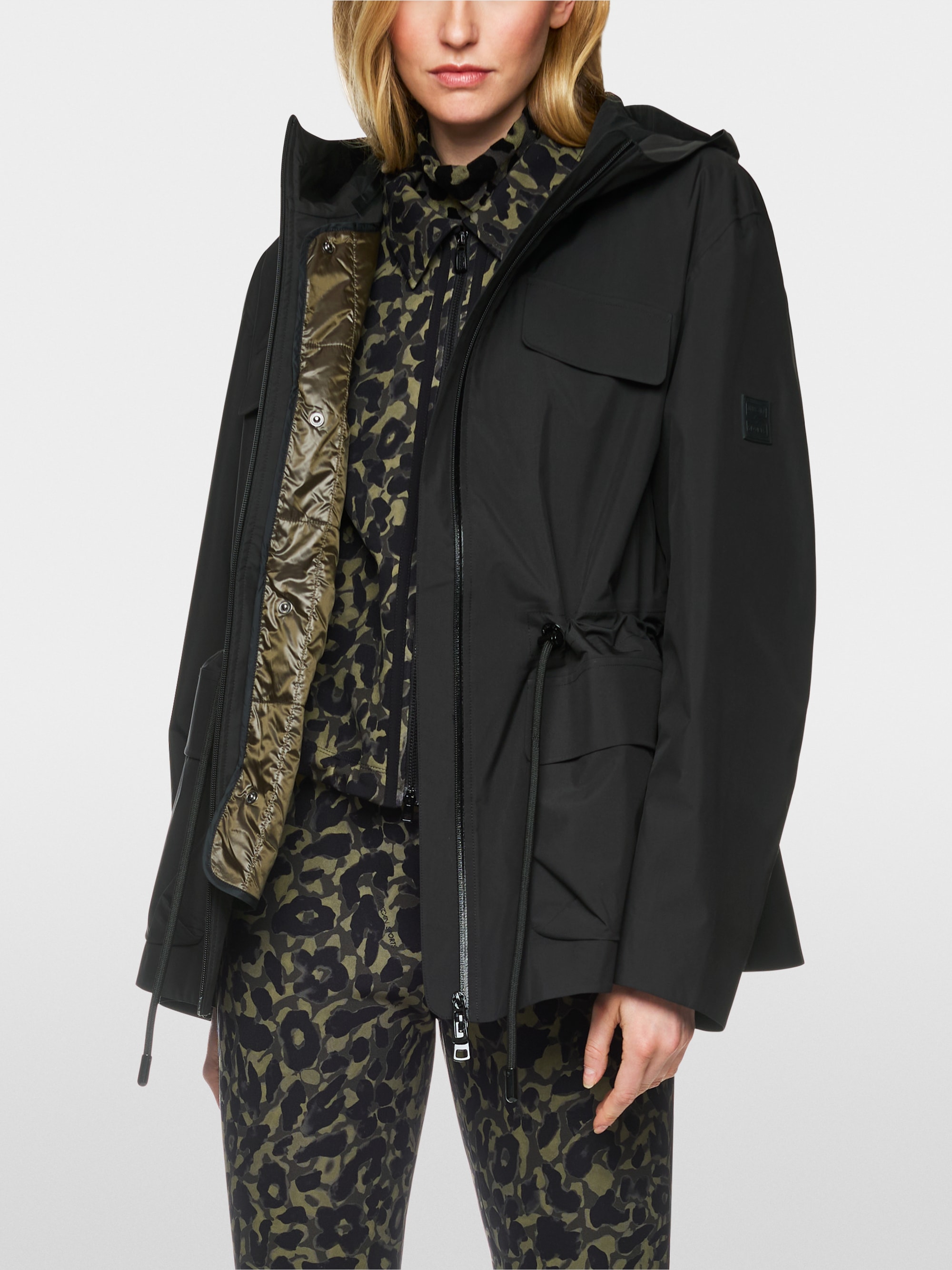 Veste outdoor avec cordon coulissant