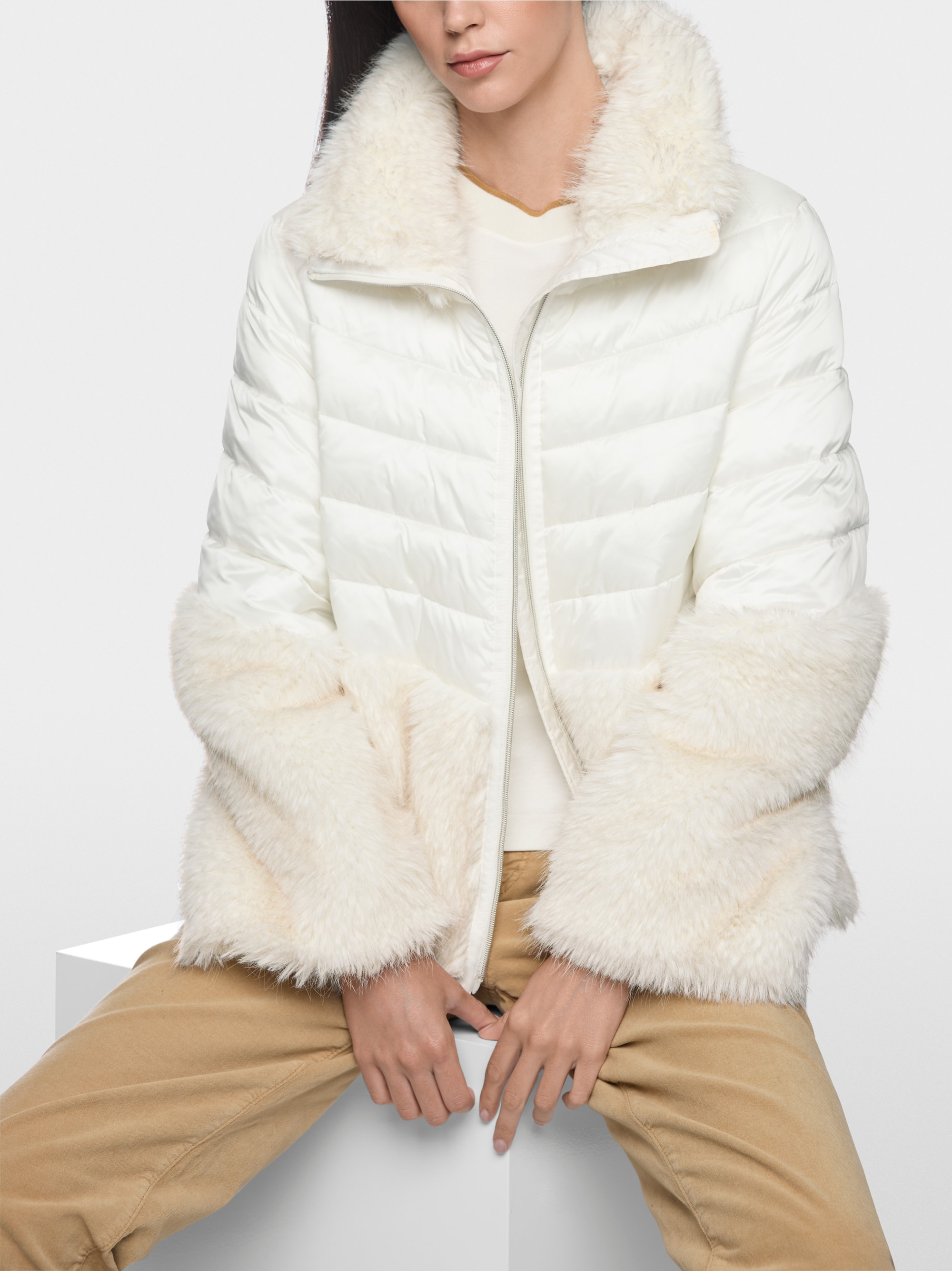 Quilted jacket with faux fur